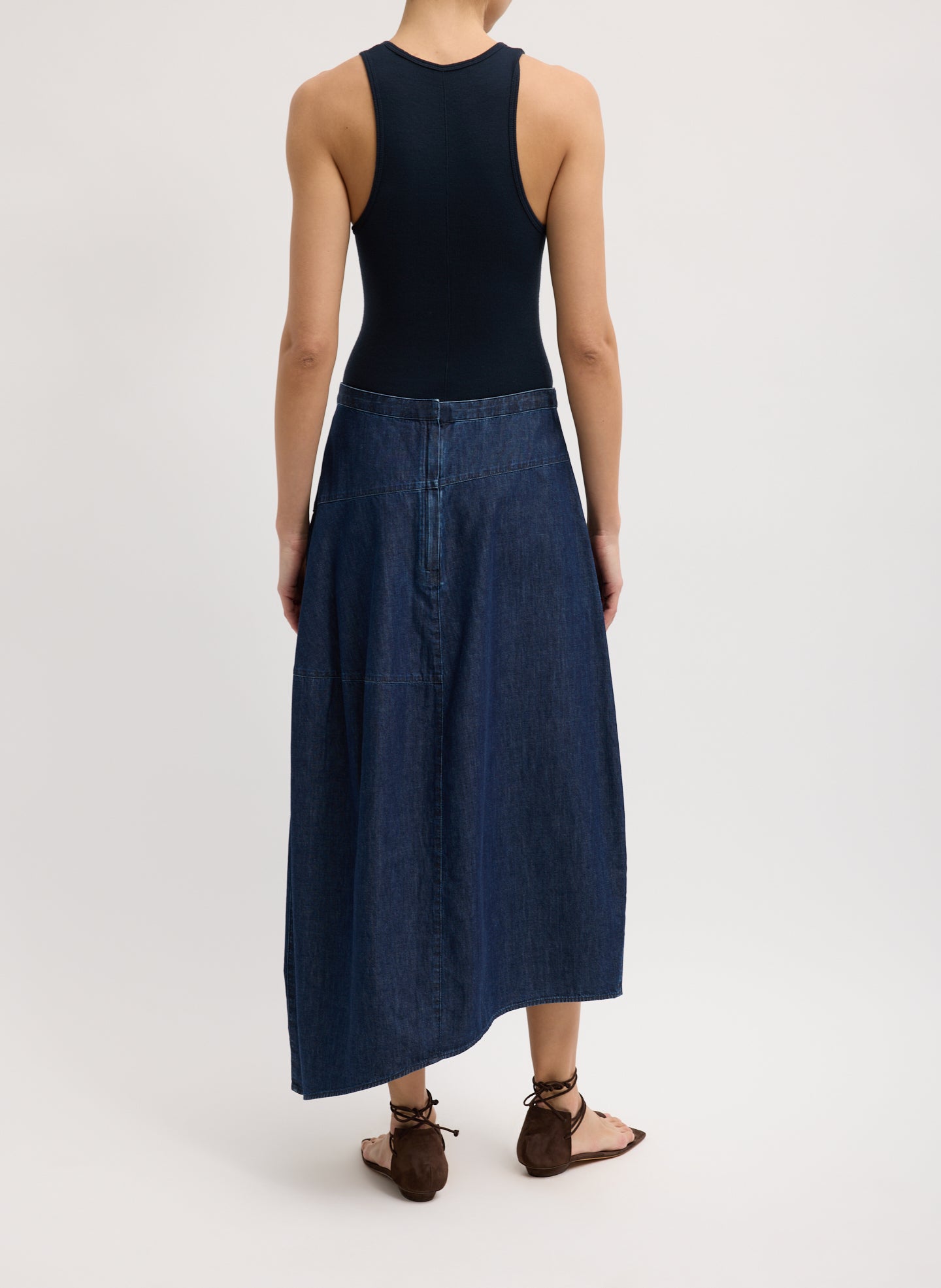 Light Weight Indigo Denim Asymmetrical Balloon Skirt - dark wash, back view on model