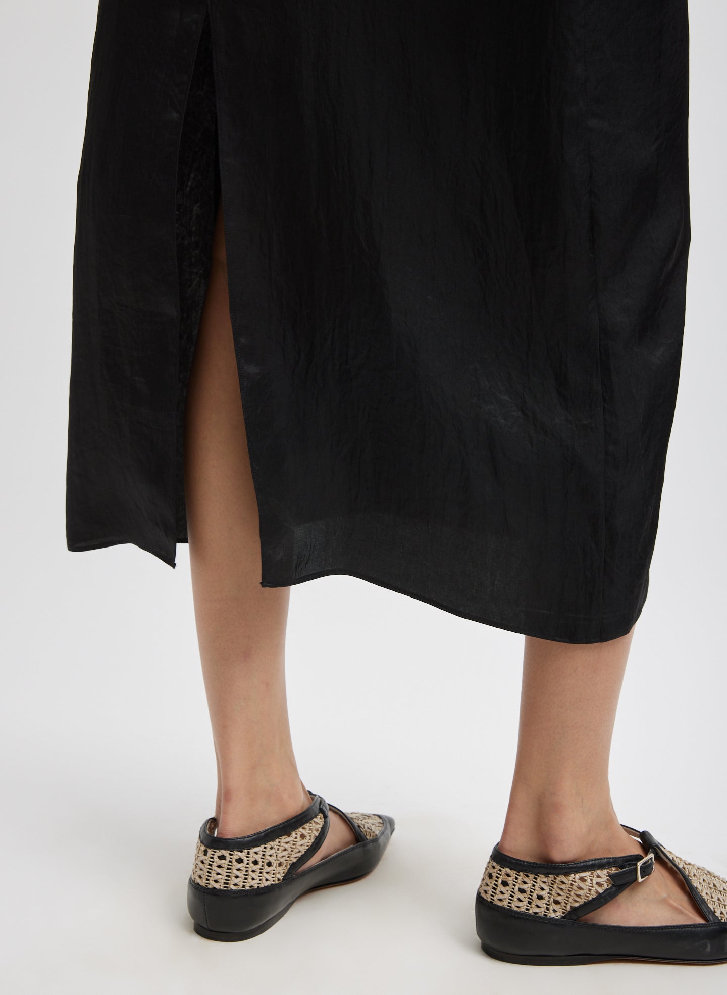 Black Slip Dress - closeup of back vent detail