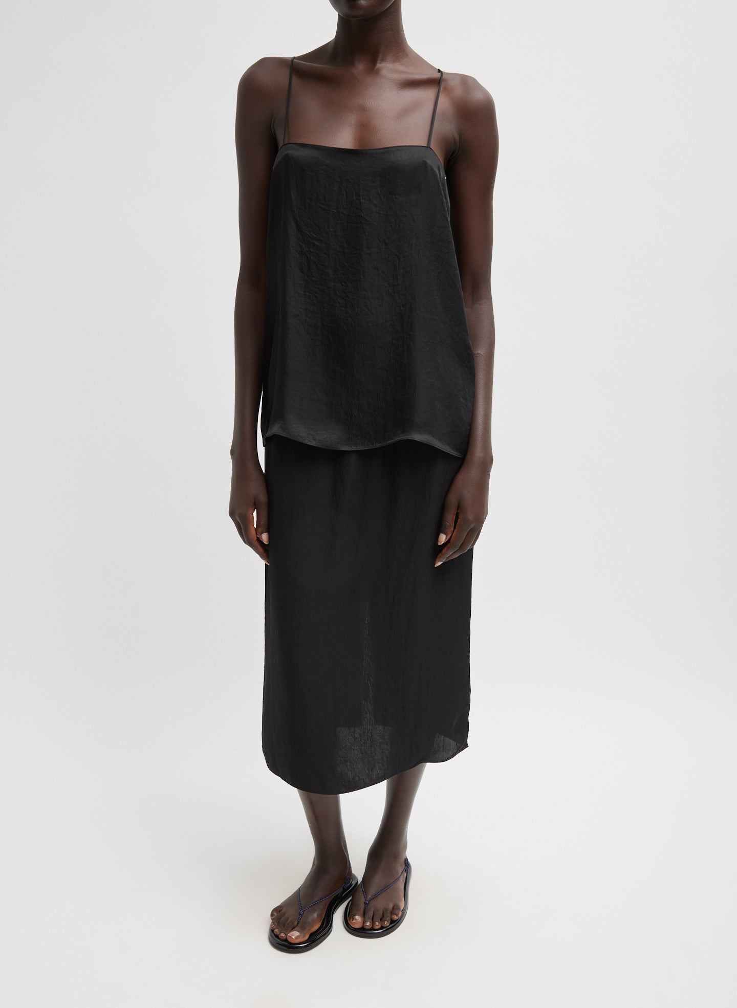 Black Slip Skirt - midi skirt, front view on model