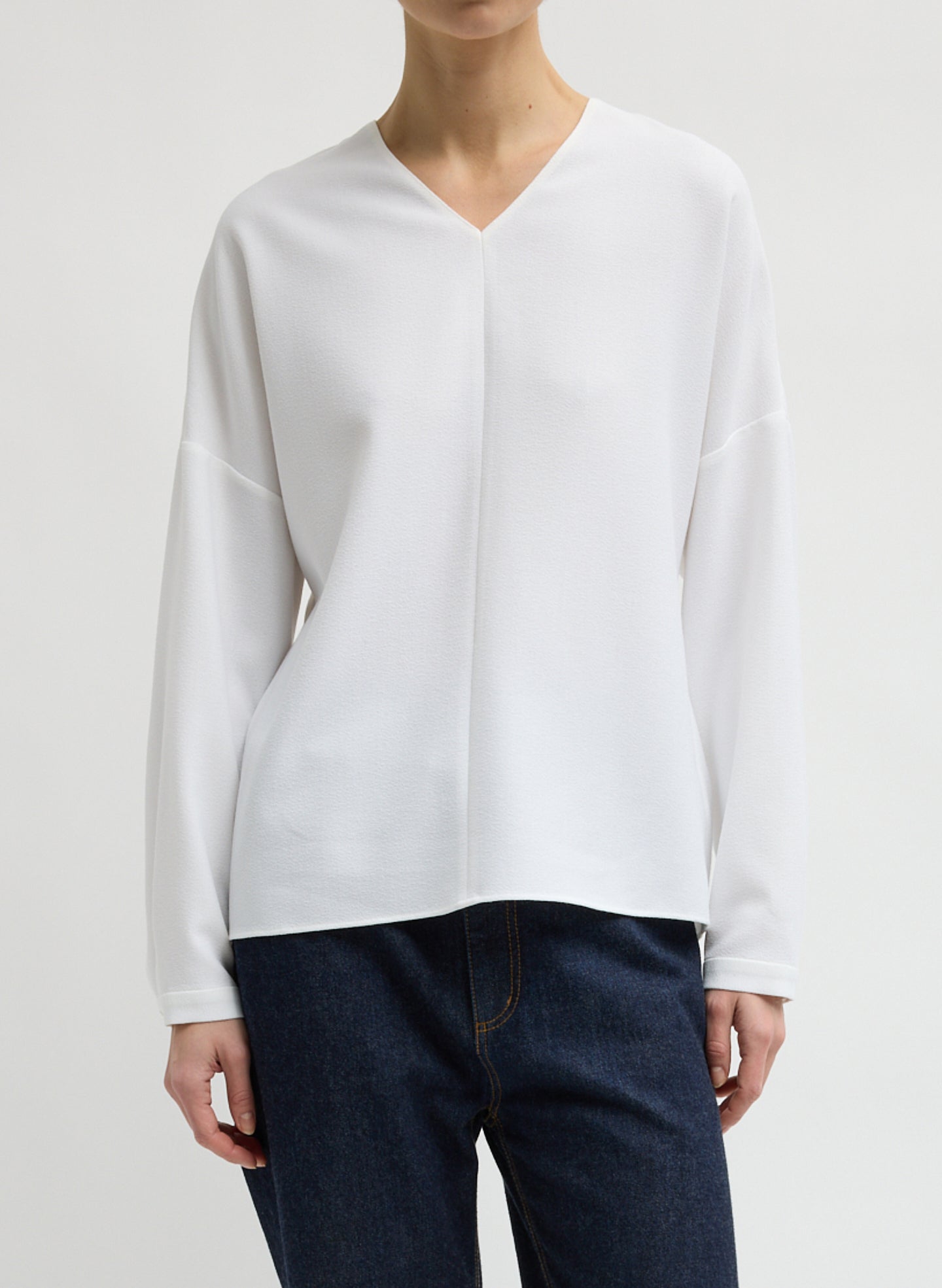 White Mica Crepe V-Neck Top - long sleeve blouse, front view on model