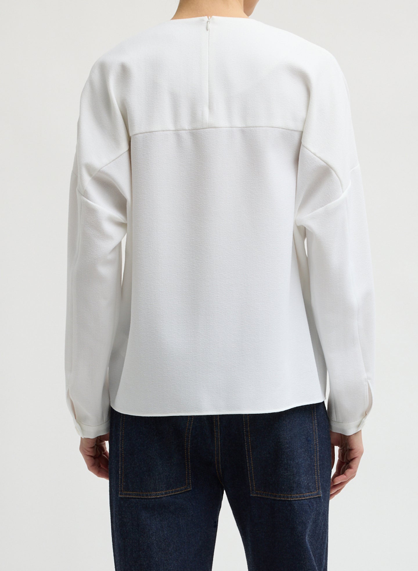 White Mica Crepe V-Neck Top - long sleeve blouse, back view on model