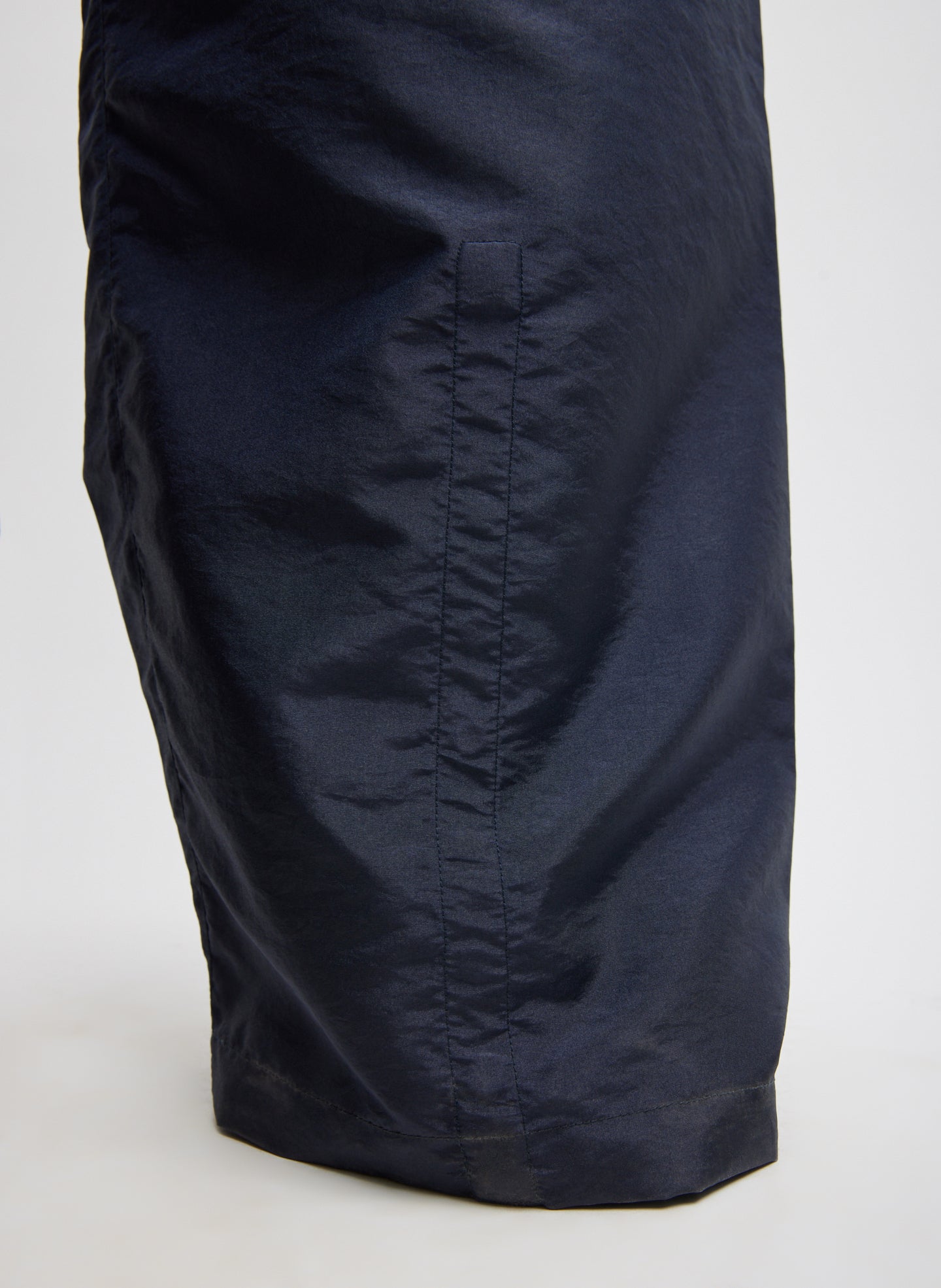 Navy Crispy Nylon Winslow Pant - closeup of hem and hidden snap details