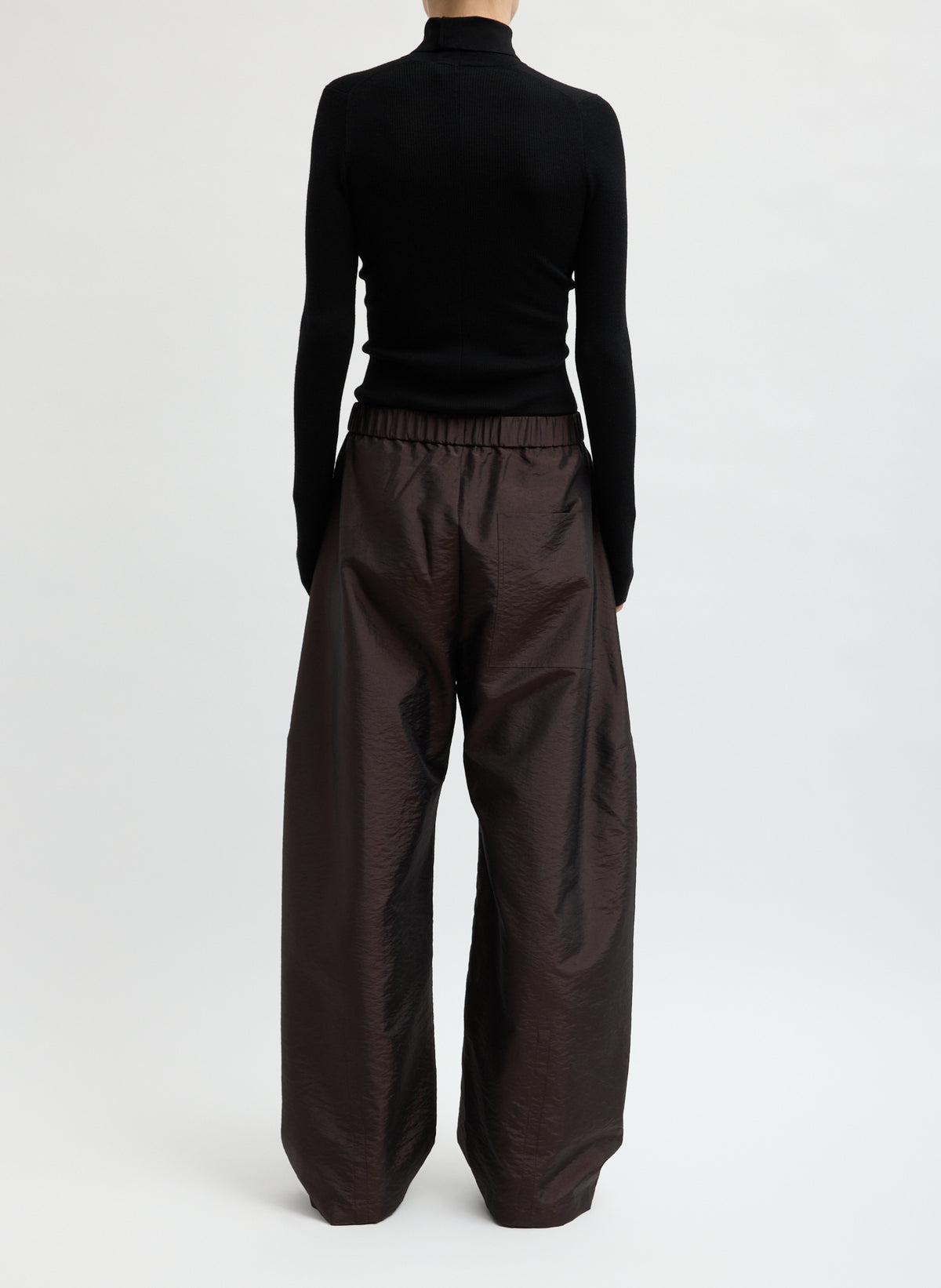 Dark Brown Crispy Nylon Winslow Pant - barrel leg pull on pant, back view on model
