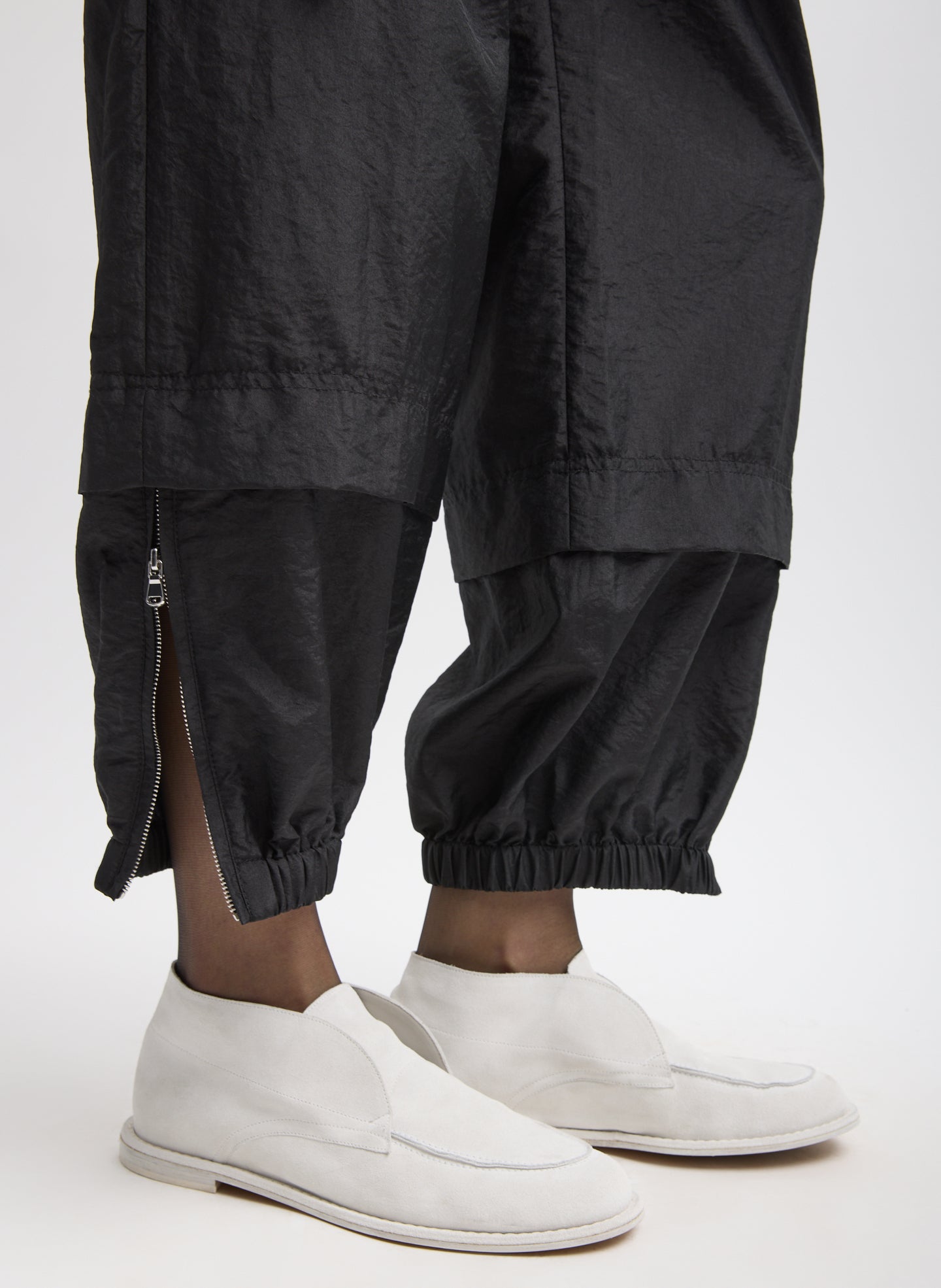 Black Crispy Nylon Wilt Pull On Jogger - closeup of zip detail at hem