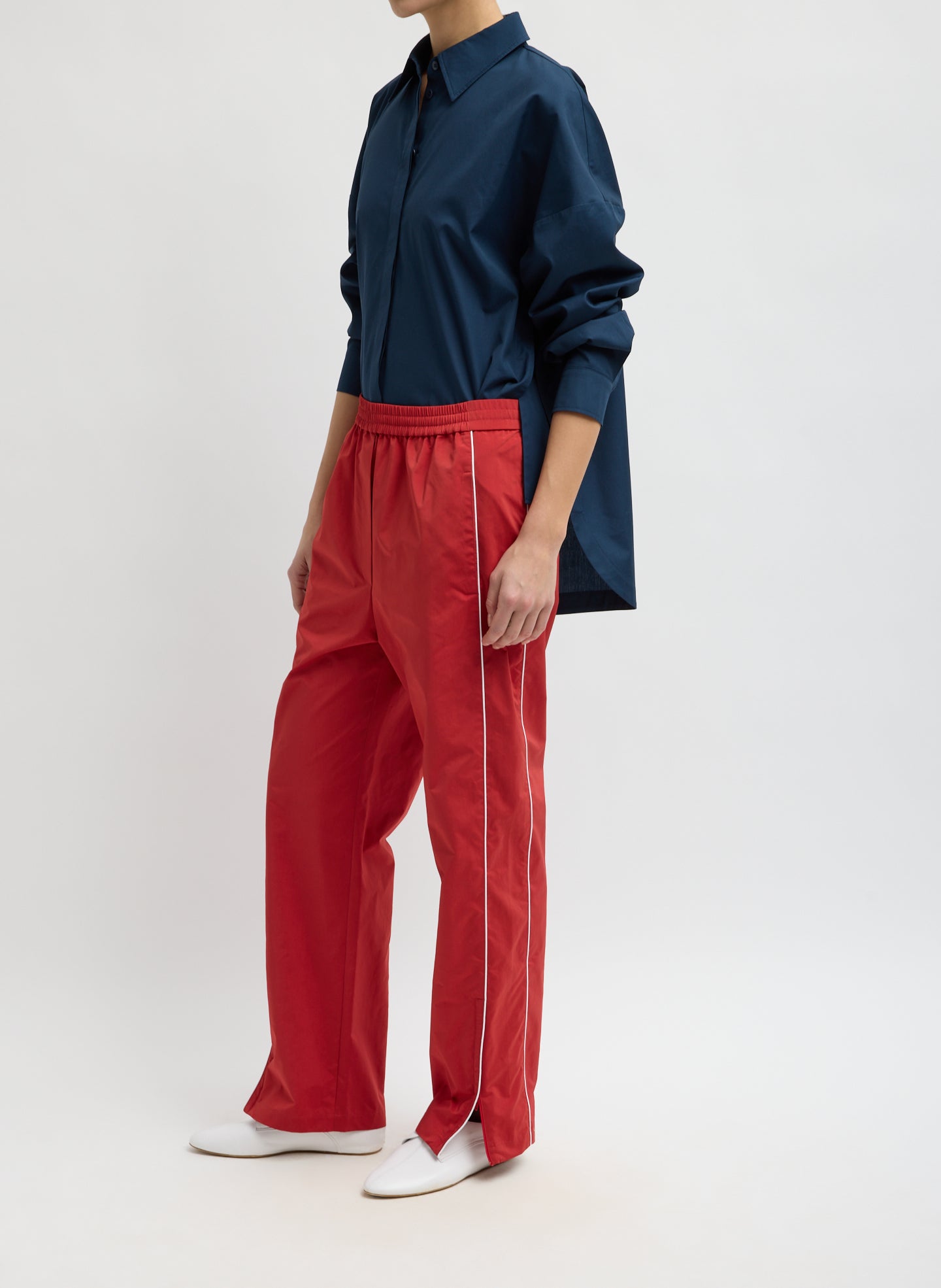 Red Nylon Piped Jogger - side view on model