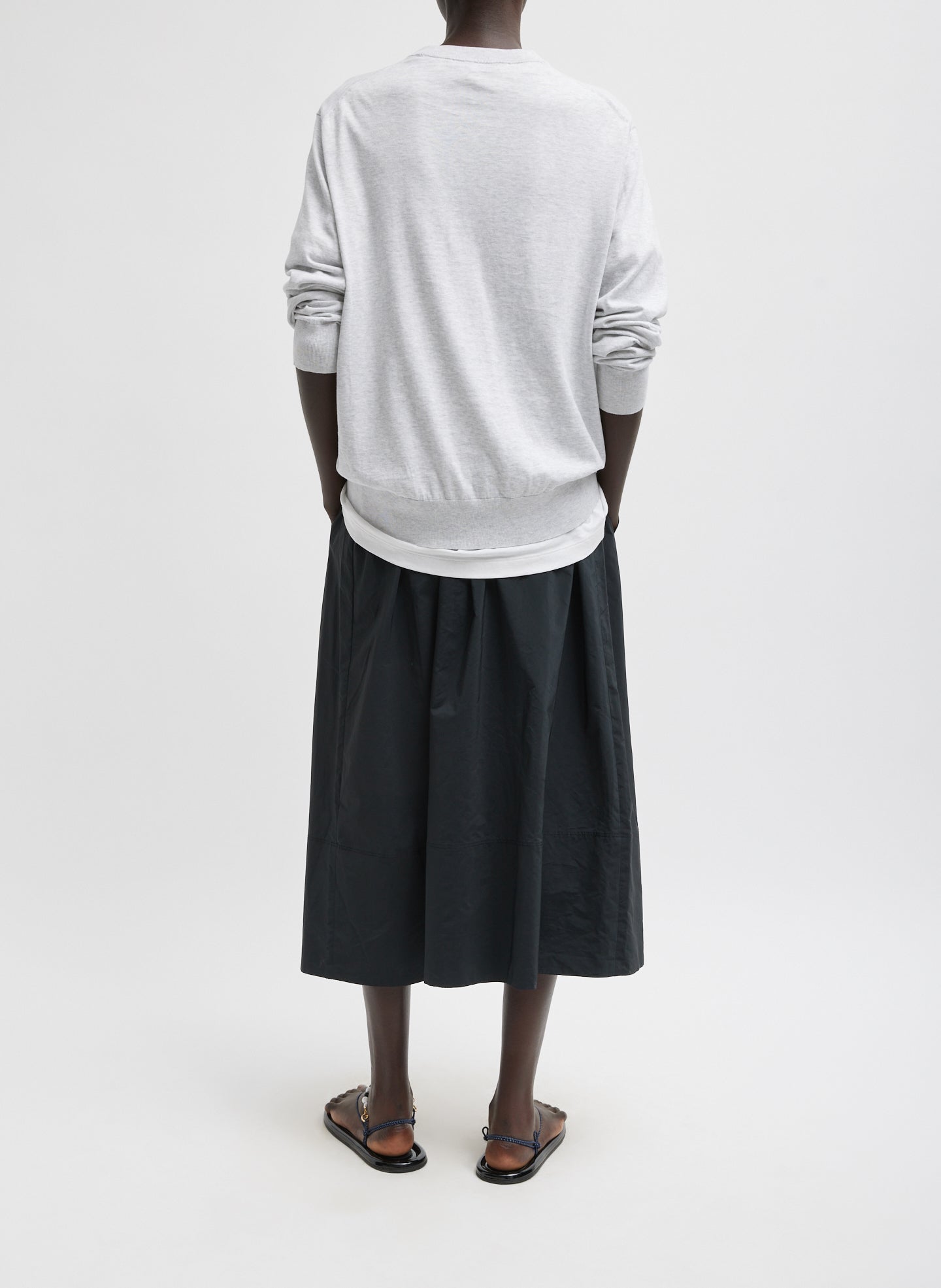 Black Nylon Pull On Full Skirt - midi skirt, back view on model