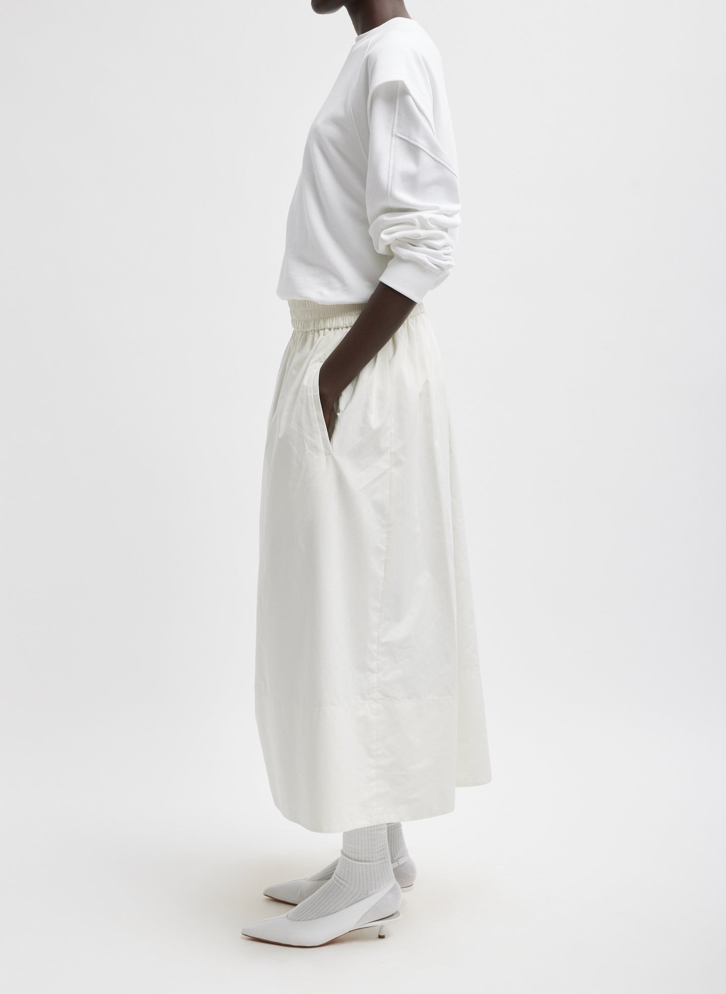 White Nylon Pull On Full Skirt - midi skirt, side view on model