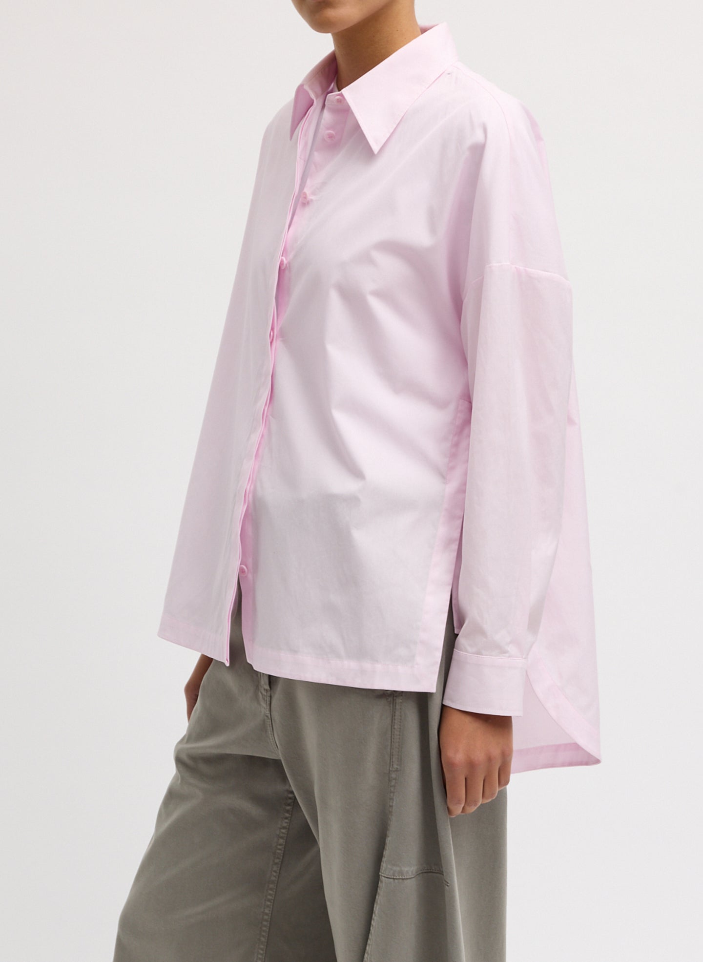 Pink Gabe Oversized Shirt - long sleeve button down, side view on model