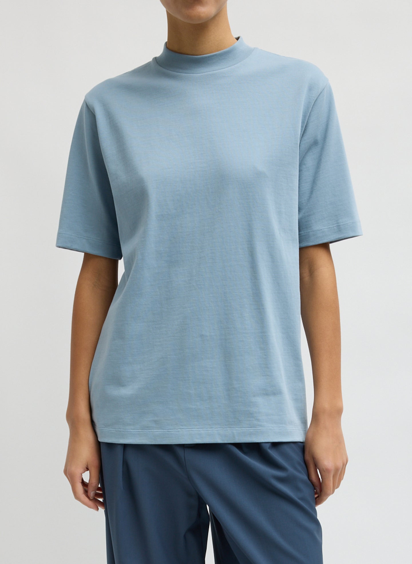 Light Blue Perfect Unisex T-Shirt - oversized t-shirt, front view on model