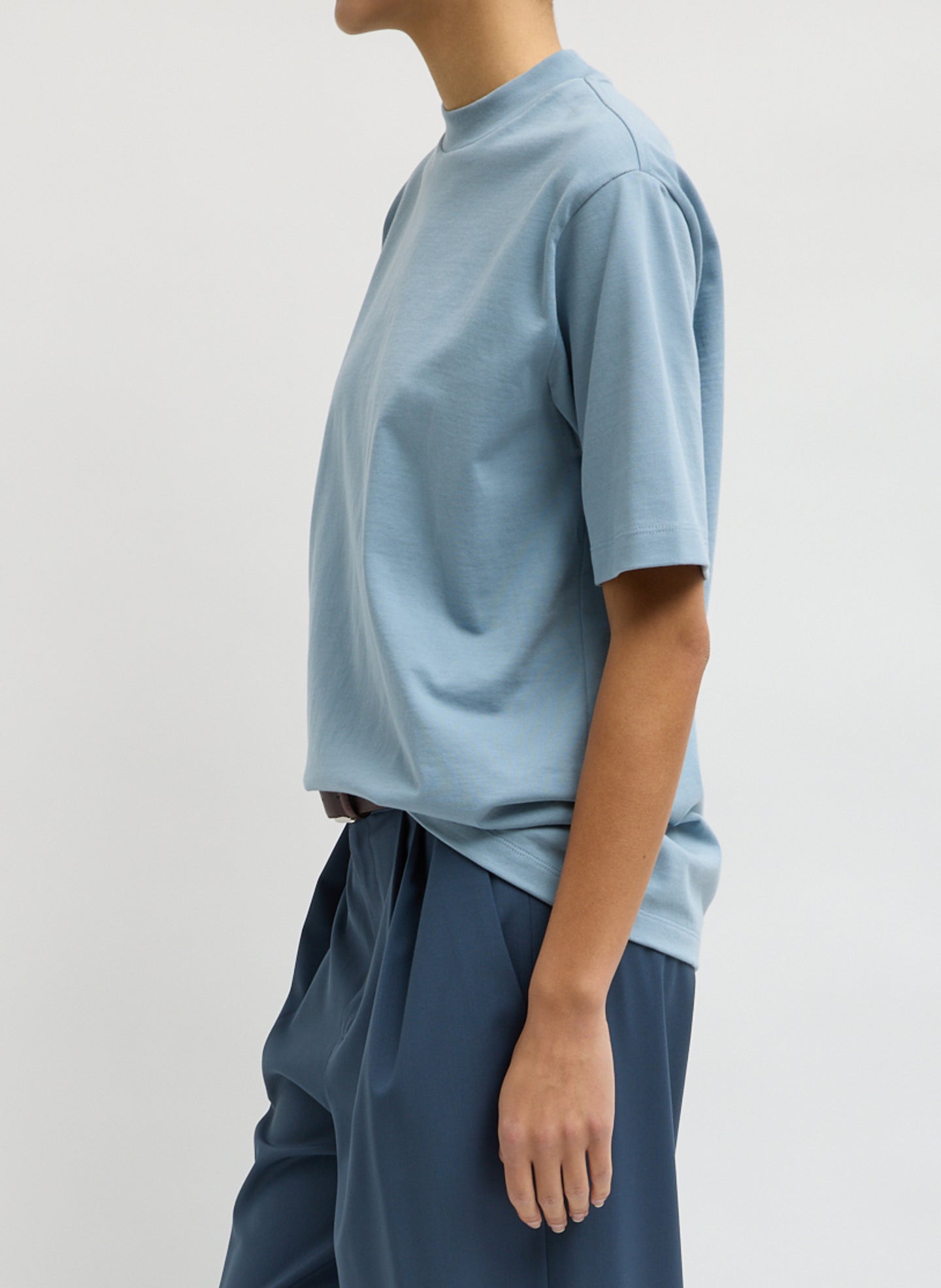 Light Blue Perfect Unisex T-Shirt - oversized t-shirt, side view on model