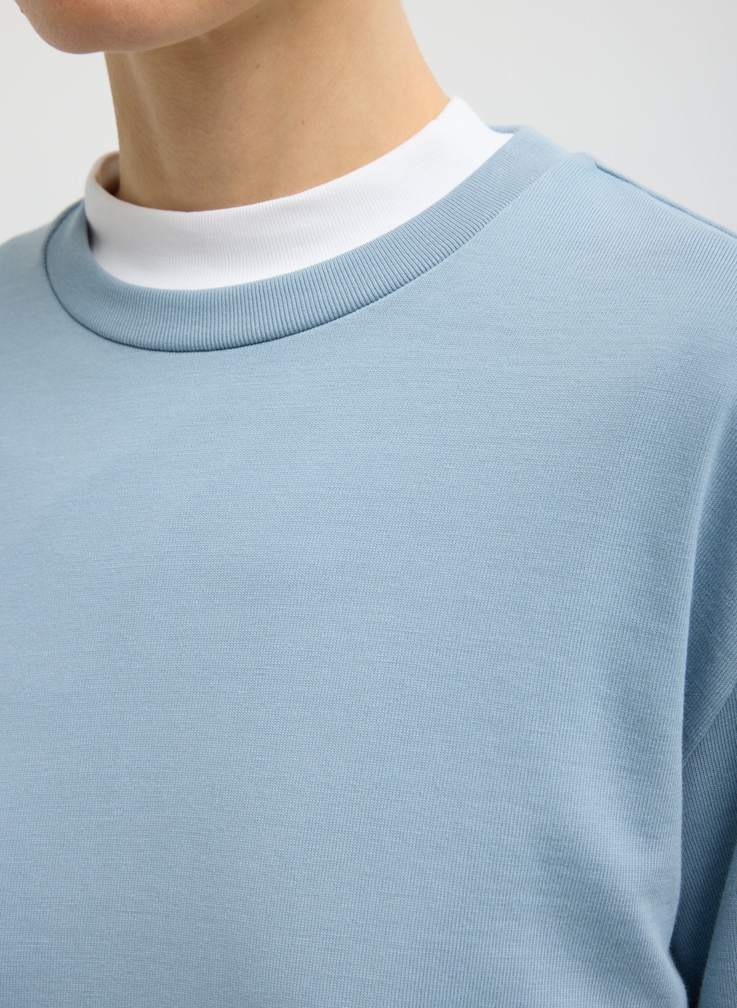 Light Blue Perfect Unisex Long Sleeve T-Shirt - closeup of neckline