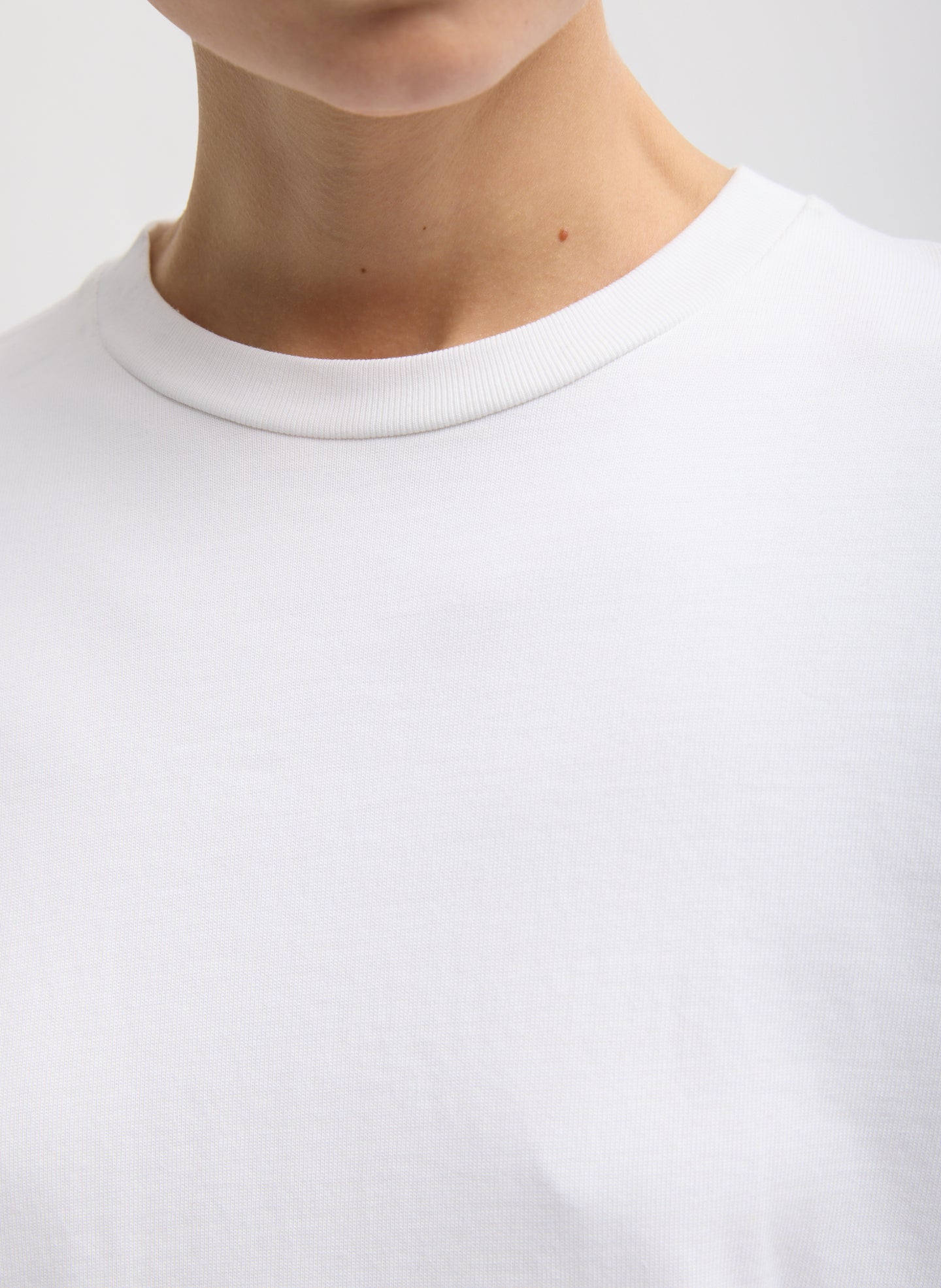 White Perfect Unisex Long Sleeve T-Shirt - closeup of neckline