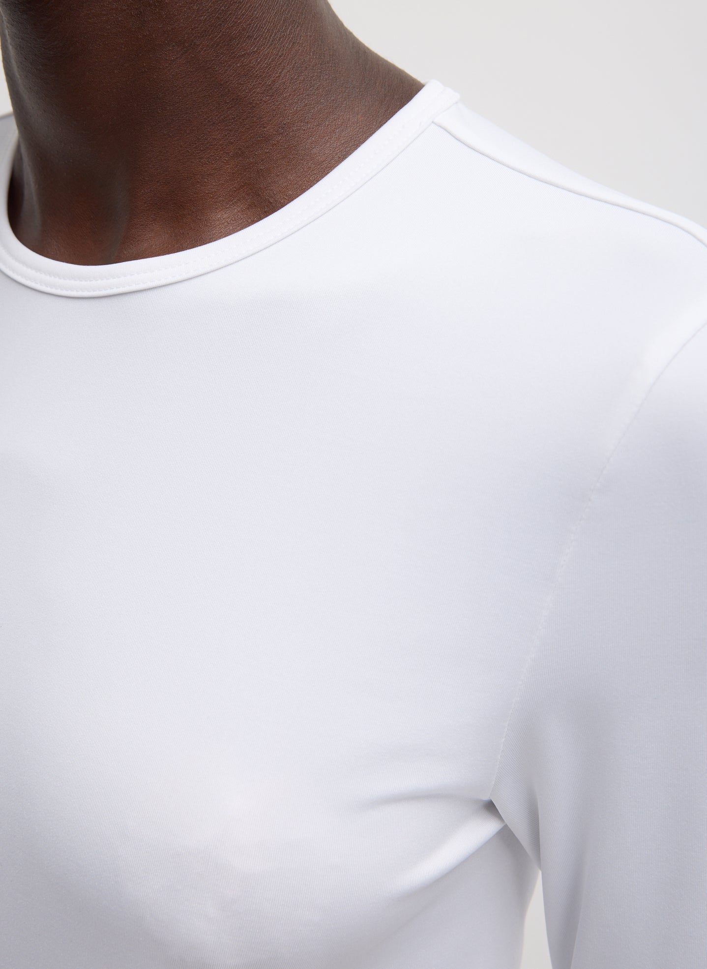 White Stretch Light Weight Tech Knit Pullover - closeup of neckline