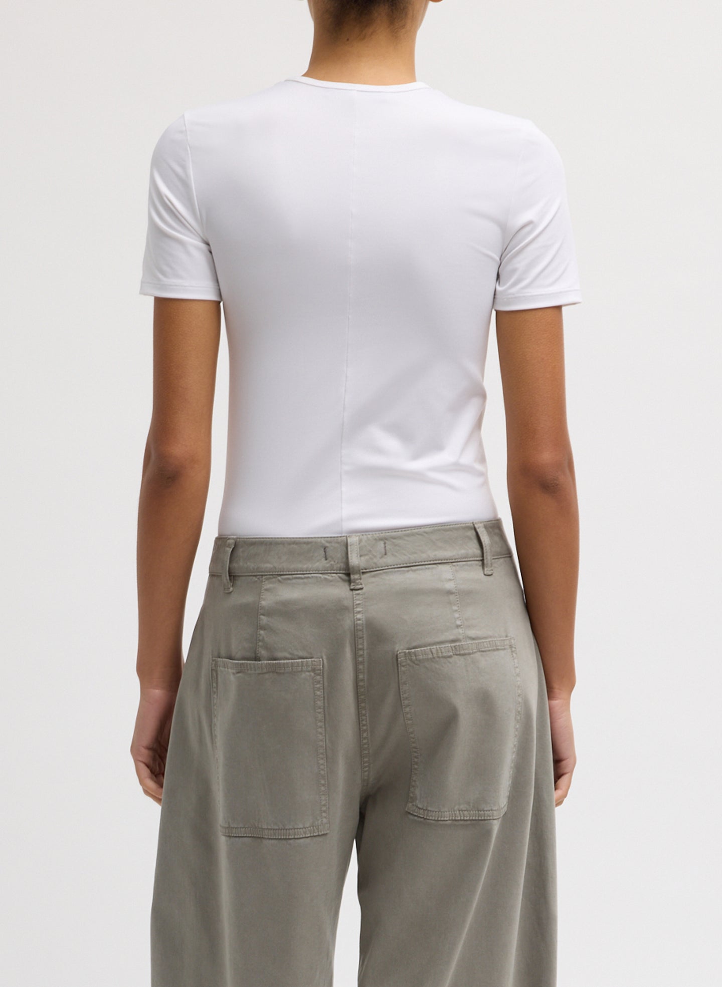 White Stretch Light Weight Tech Knit Short Sleeve T-Shirt - back view on model