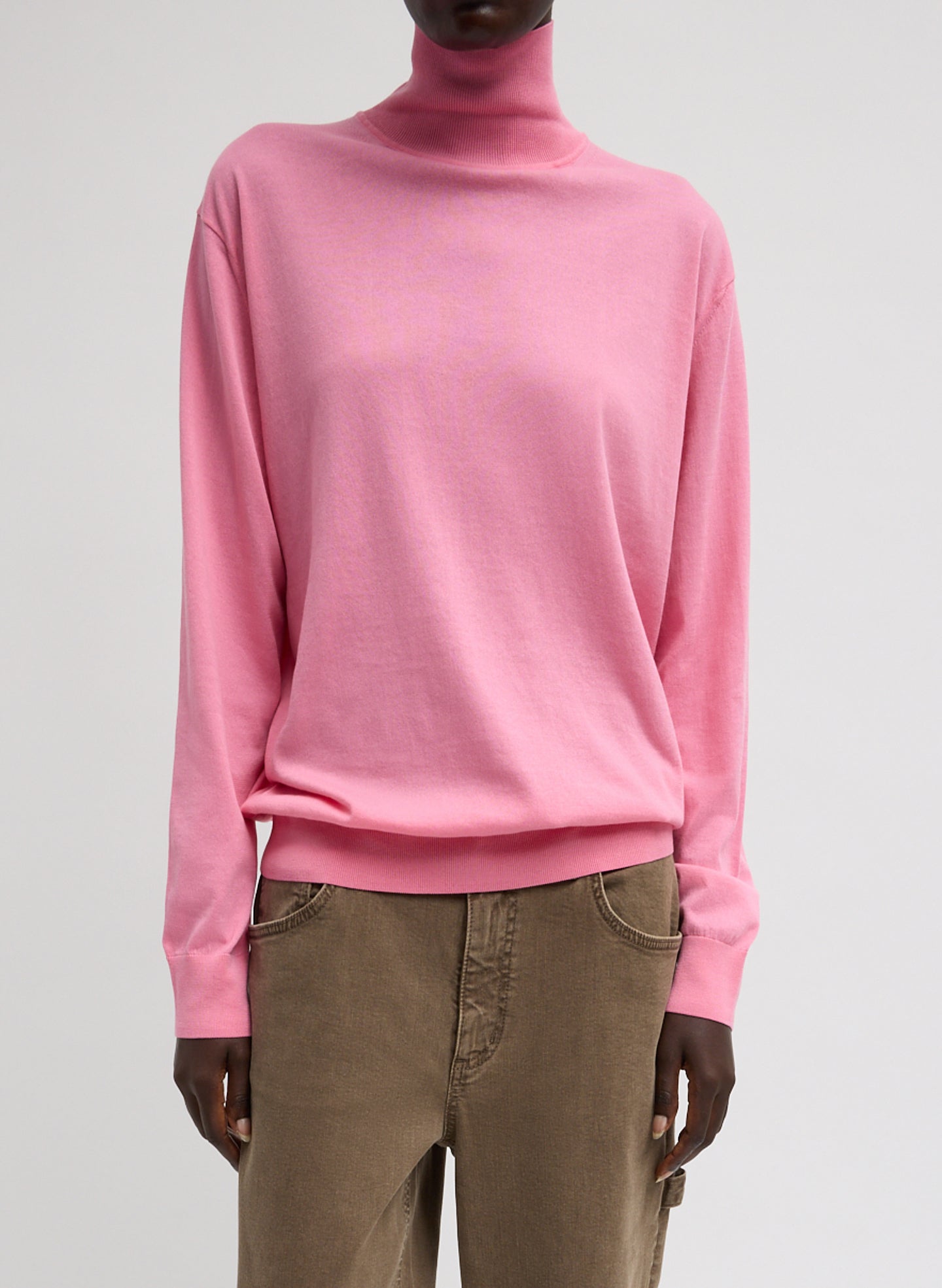 Bubble Gum Pink Super Fine Gauge Turtleneck - thin turtleneck top, front view on model