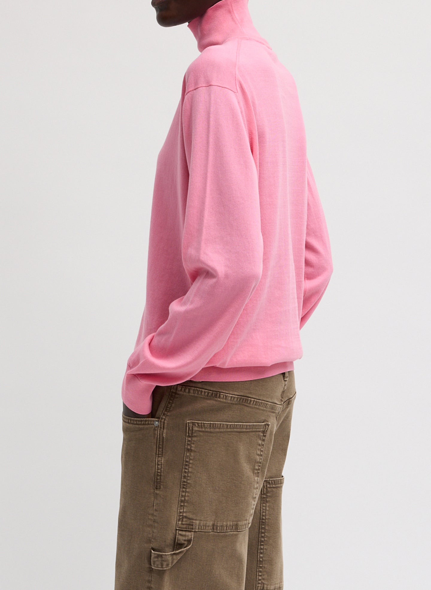 Bubble Gum Pink Super Fine Gauge Turtleneck - thin turtleneck top, side view on model