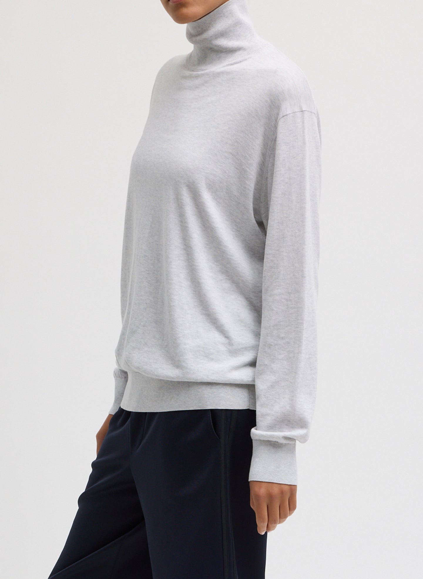 Heather Grey Super Fine Gauge Turtleneck - thin turtleneck top, side view on model