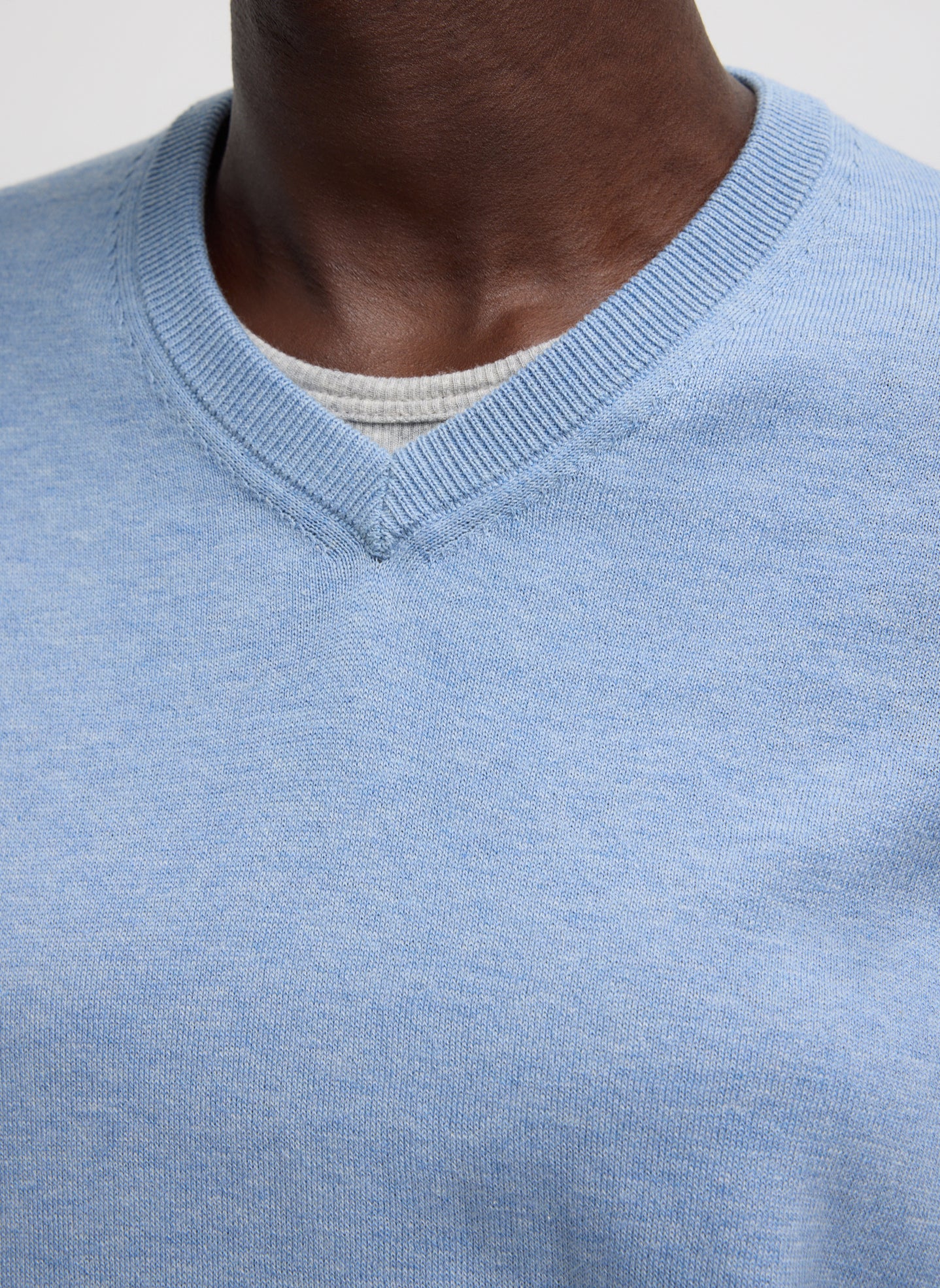 Blue Melange Super Fine Gauge V-Neck - closeup of v-neck neckline