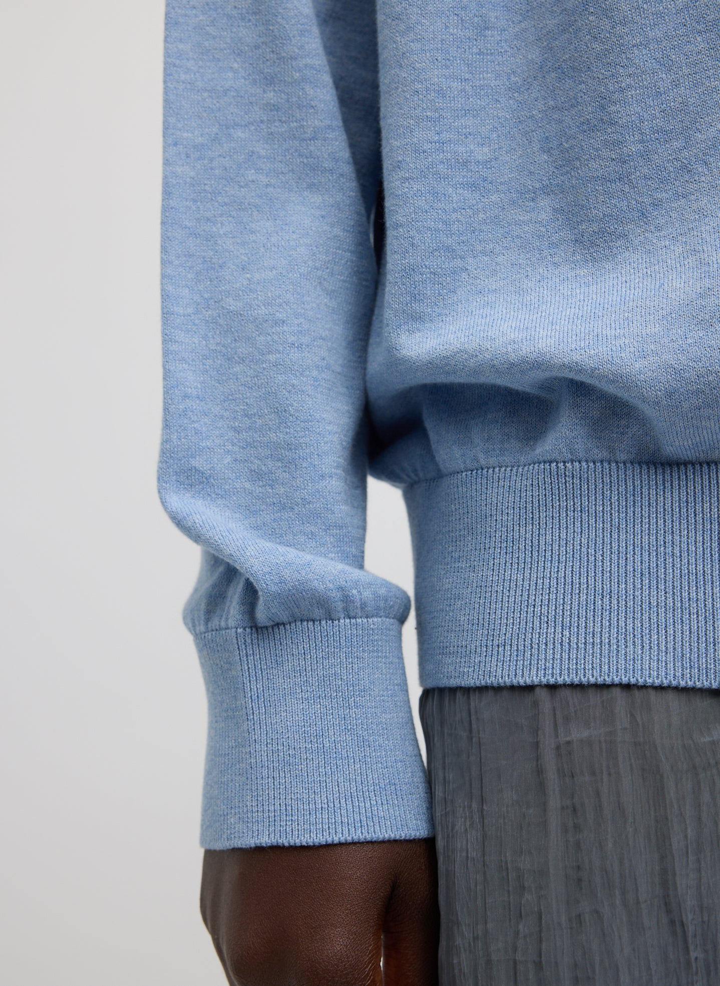 Blue Melange Super Fine Gauge V-Neck - closeup of ribbed sleeve and hem detail