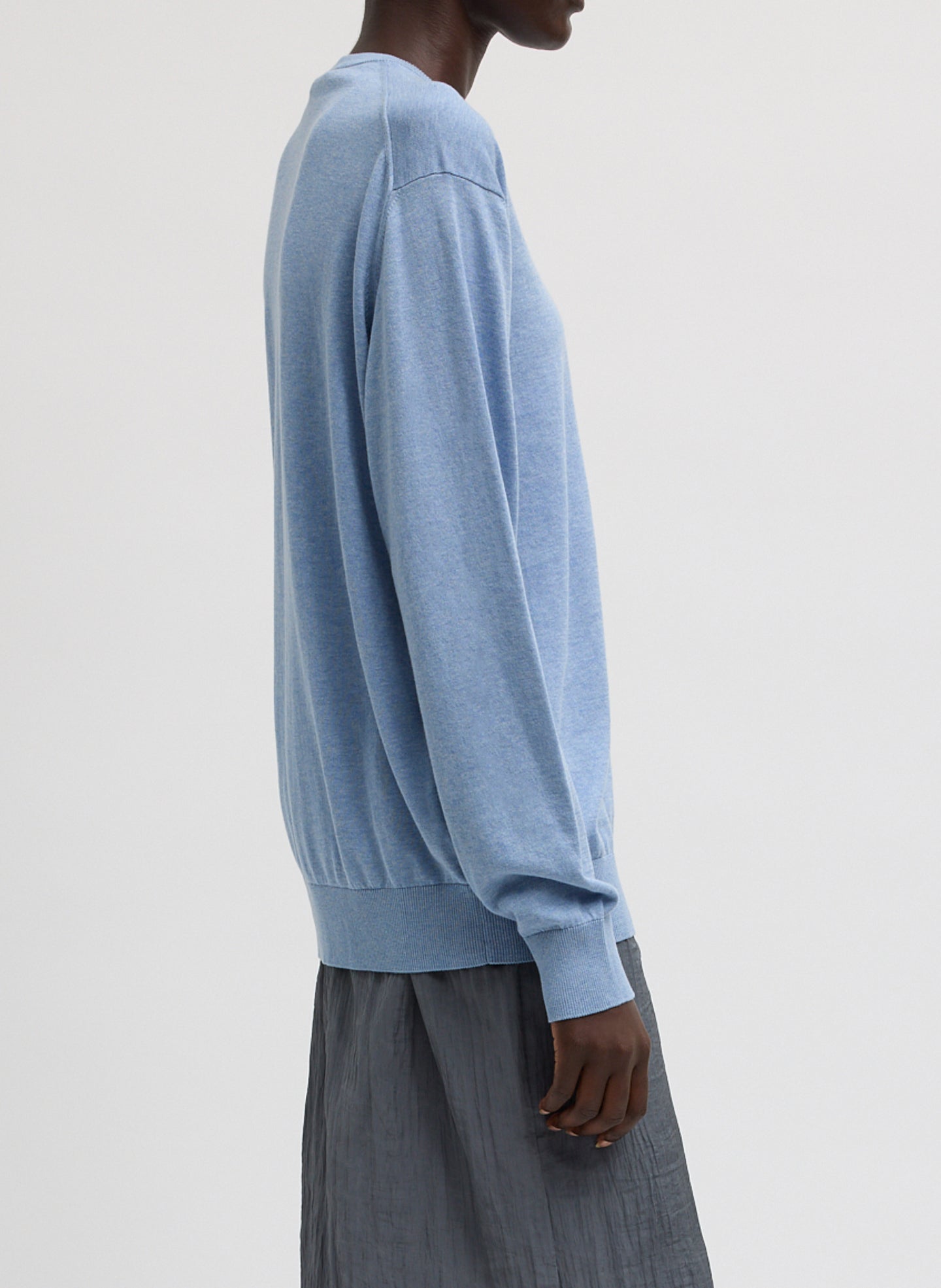 Blue Melange Super Fine Gauge V-Neck - thin v-neck top, side view on model