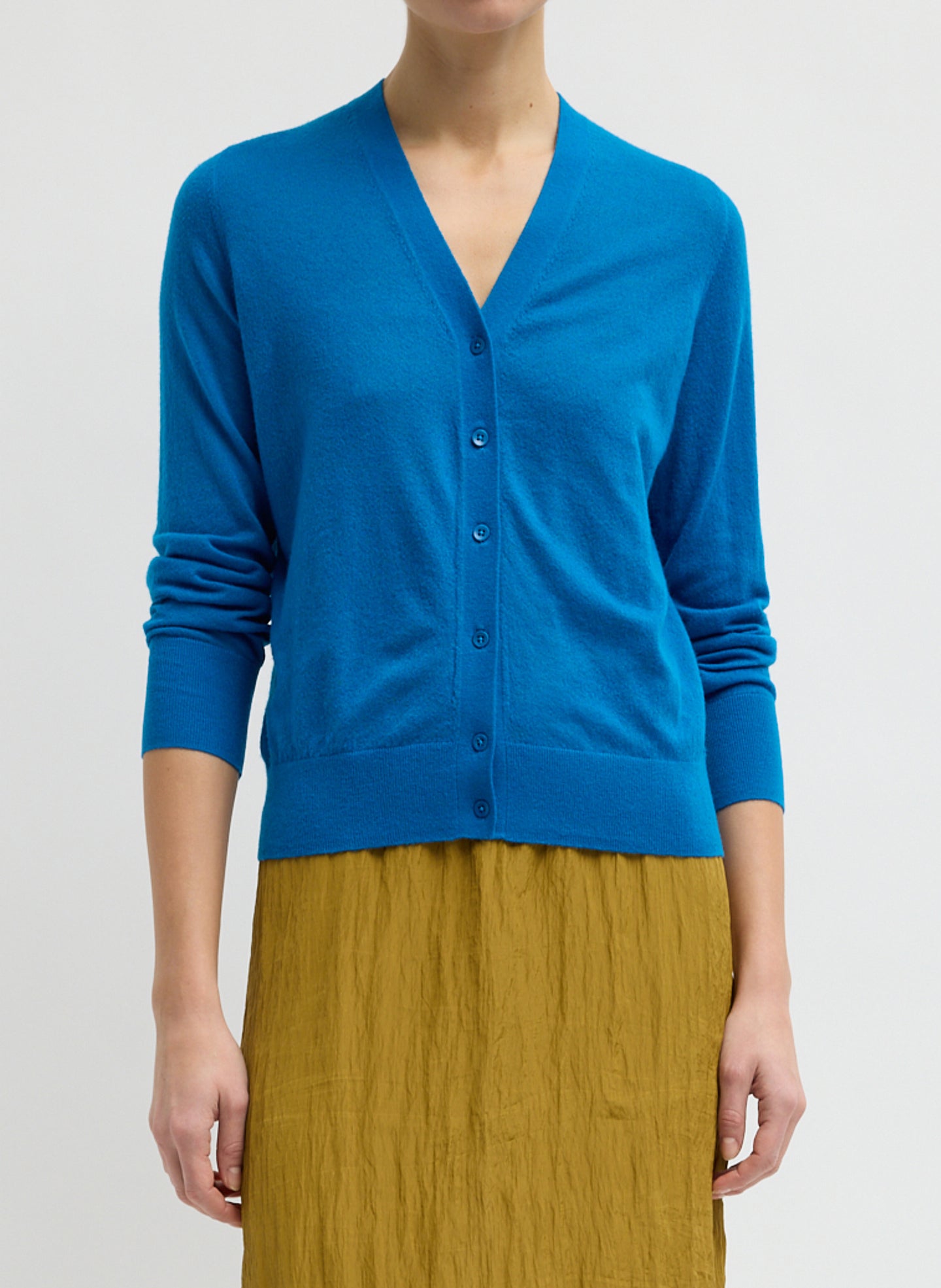 Bright Blue Skinlike Mercerized Wool V-Neck Shrunken Cardigan - front view on model