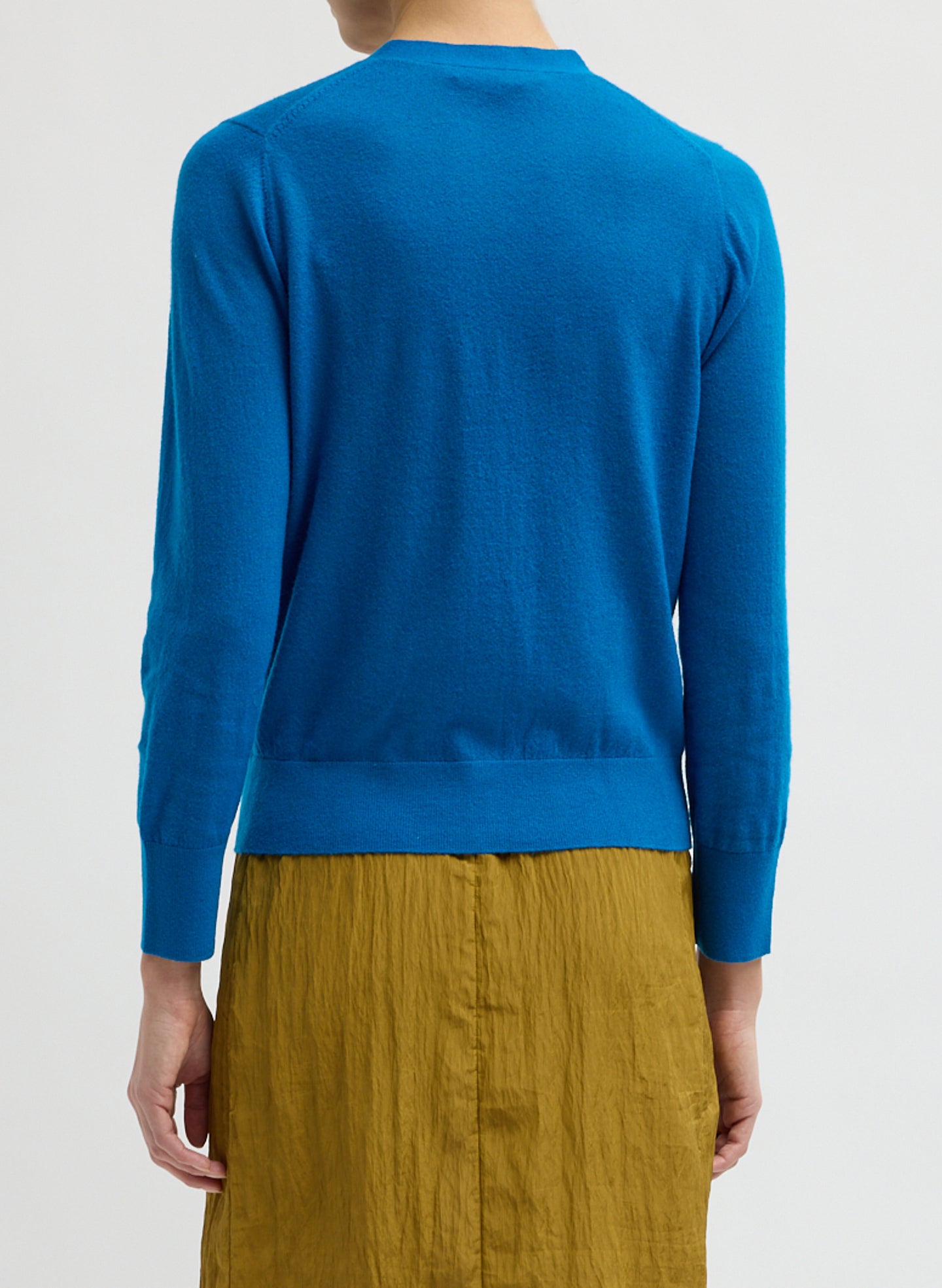 Bright Blue Skinlike Mercerized Wool V-Neck Shrunken Cardigan - back view on model