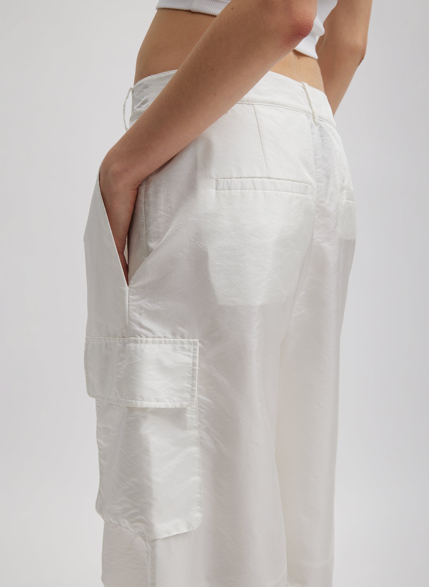 White Stella Crispy Nylon Pleated Cargo Pant -closeup of back and side pocket details
