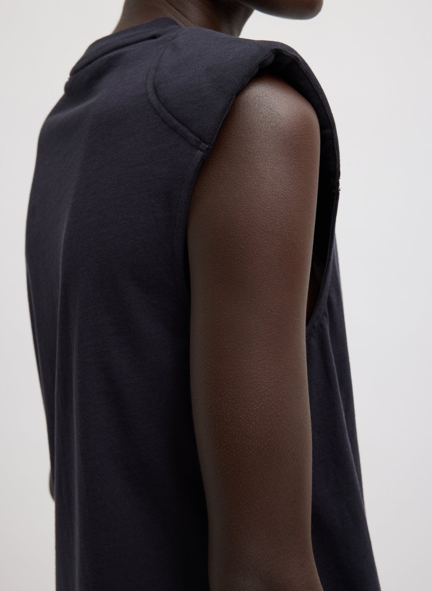Dark Navy T-Shirt Program Padded Shoulder Sleeveless Top - closeup of padded shoulder
