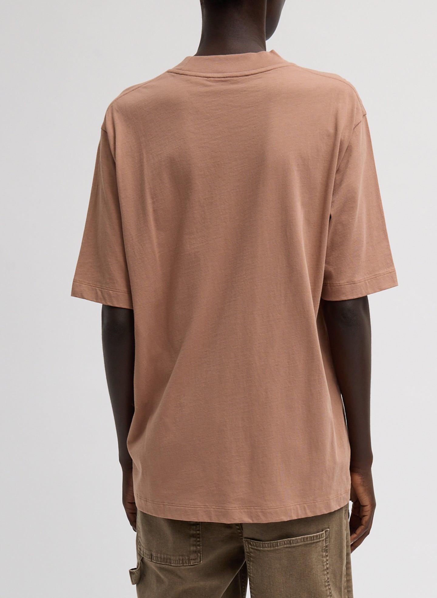 Butterscotch Mock Neck Unisex T-Shirt - oversized t-shirt, back view on model