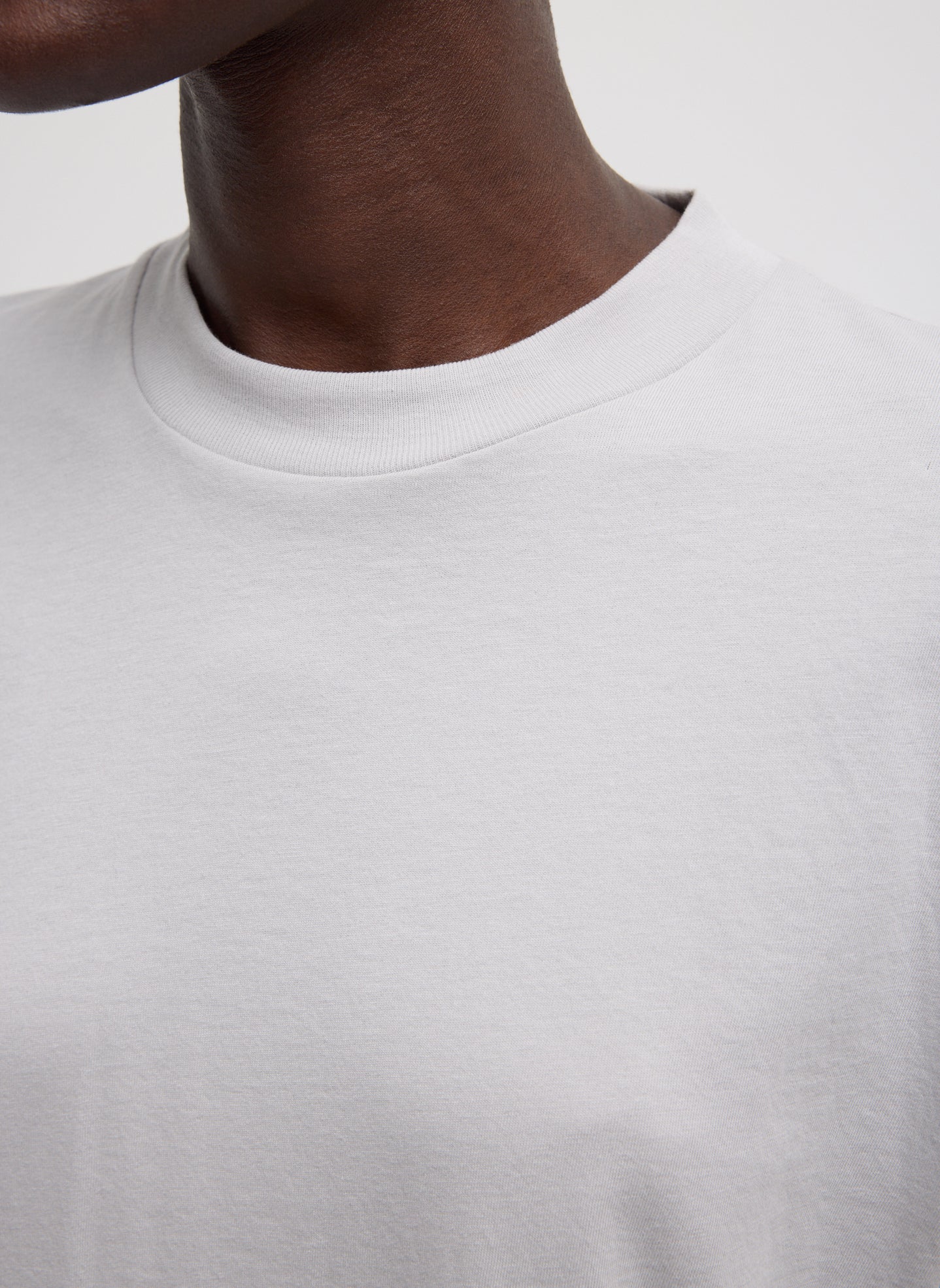 Light Grey Mock Neck Unisex T-Shirt - closeup of mock neckline
