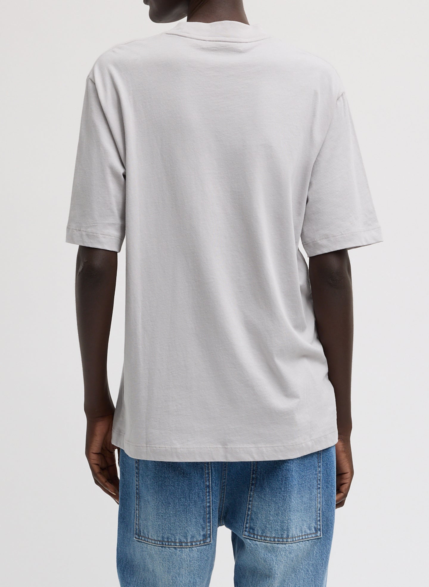 Light Grey Mock Neck Unisex T-Shirt - oversized t-shirt, back view on model