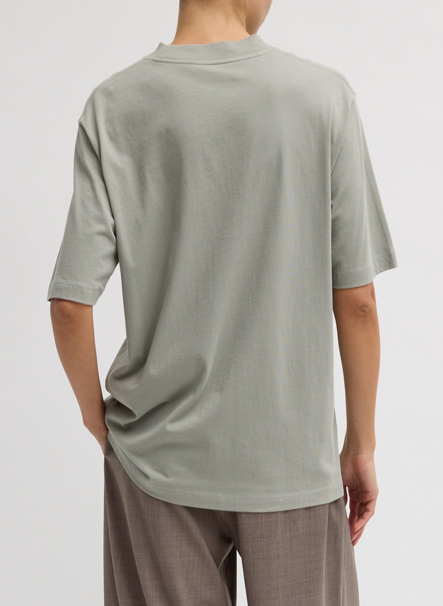 Pumice Grey Mock Neck Unisex T-Shirt - oversized t-shirt, back view on model