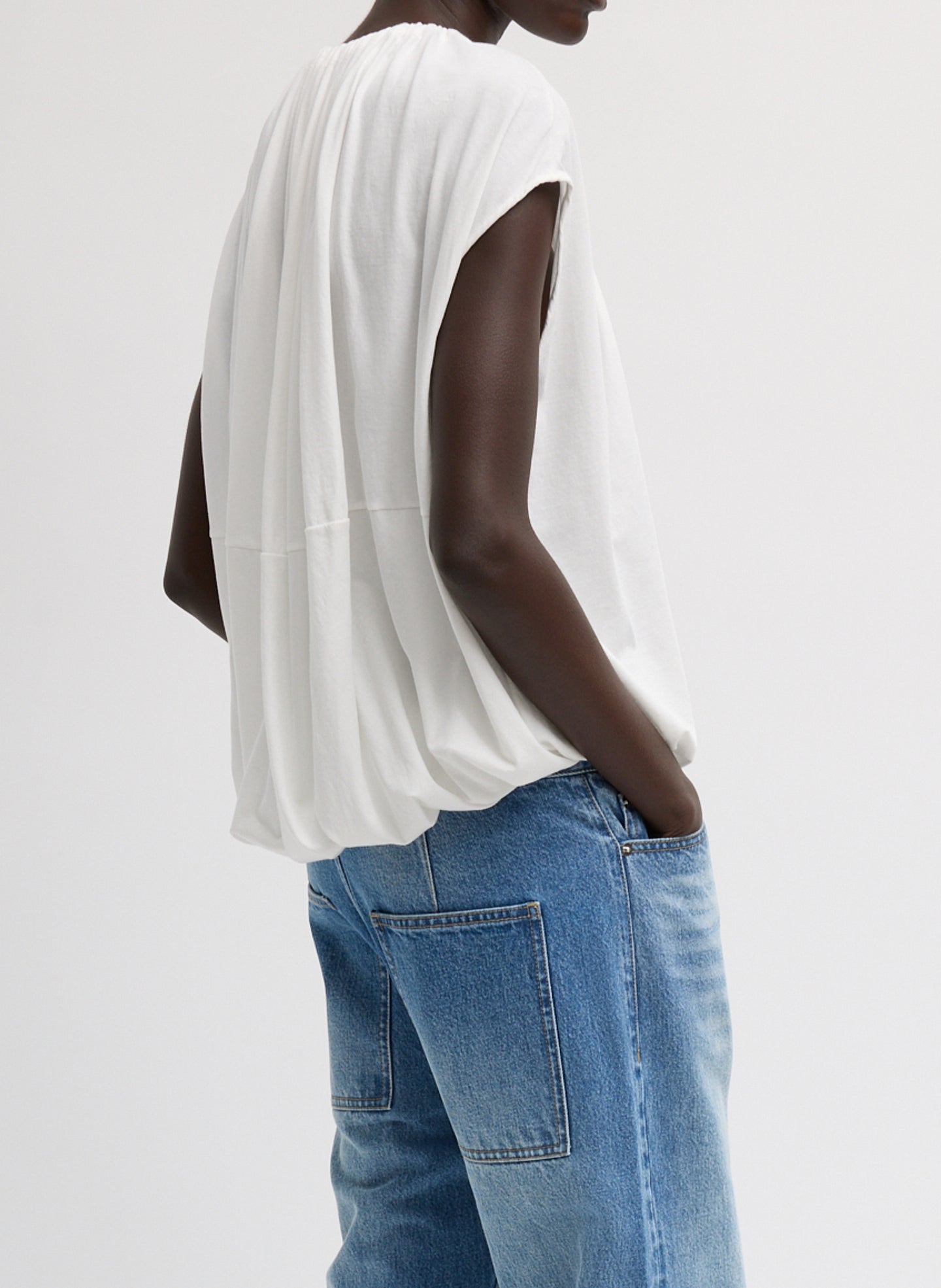 White T-Shirt Program Shirred Neck Sleeveless Top - side view on model