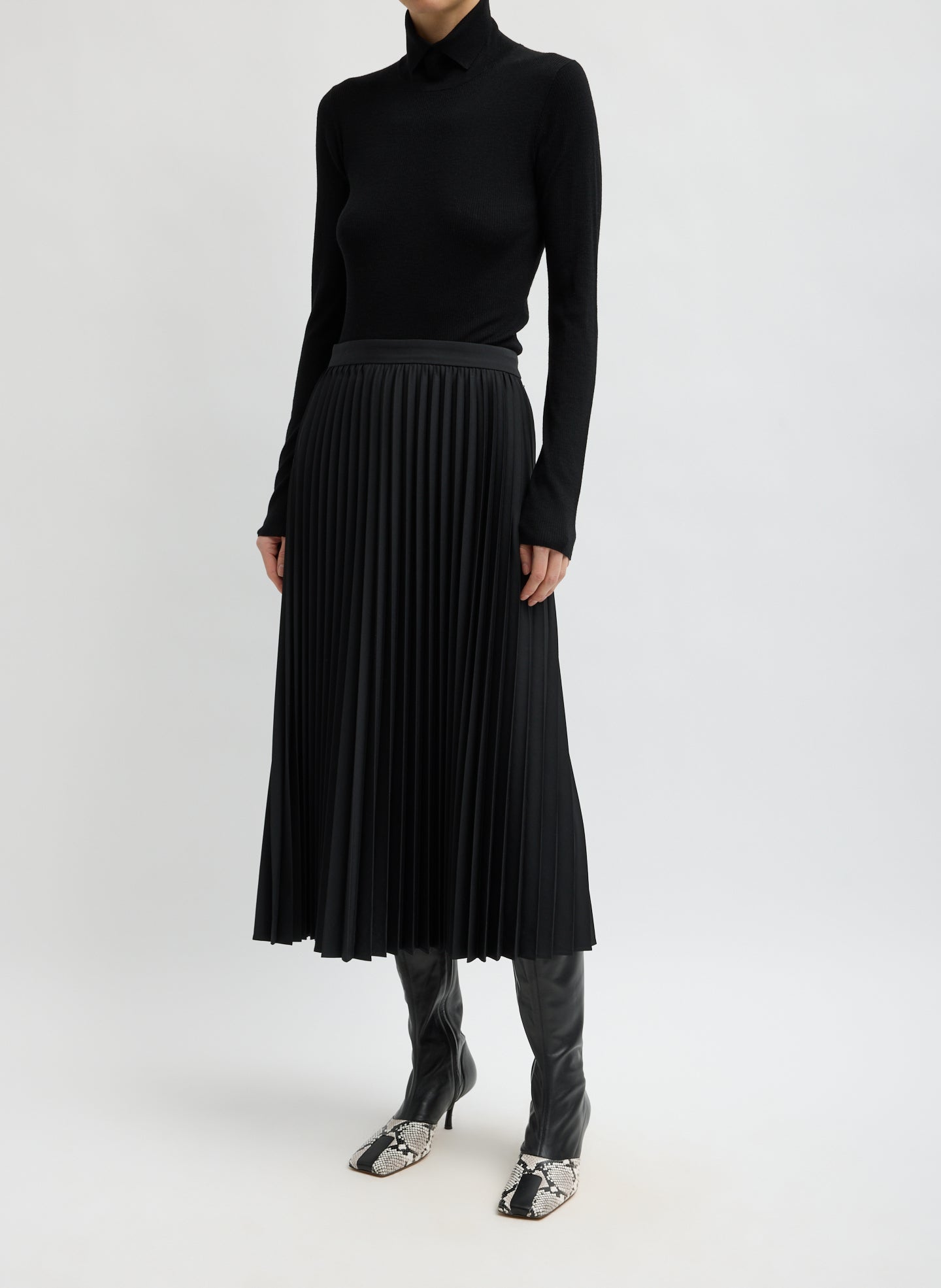 Black Tropical Wool Pleating Sunray Skirt - pleated midi skirt, front view on model
