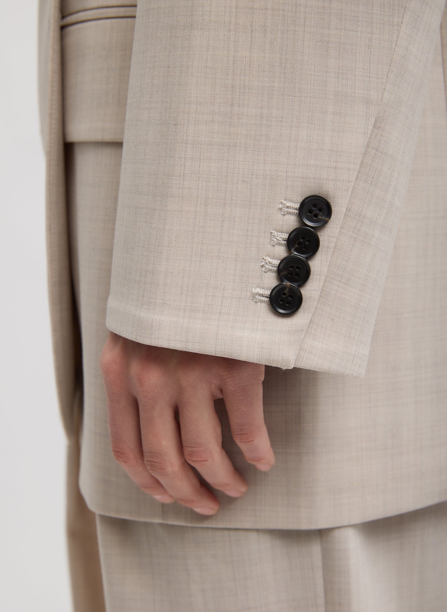 Oatmeal Melange Tropical Wool Liam Blazer - closeup of button details at sleeve