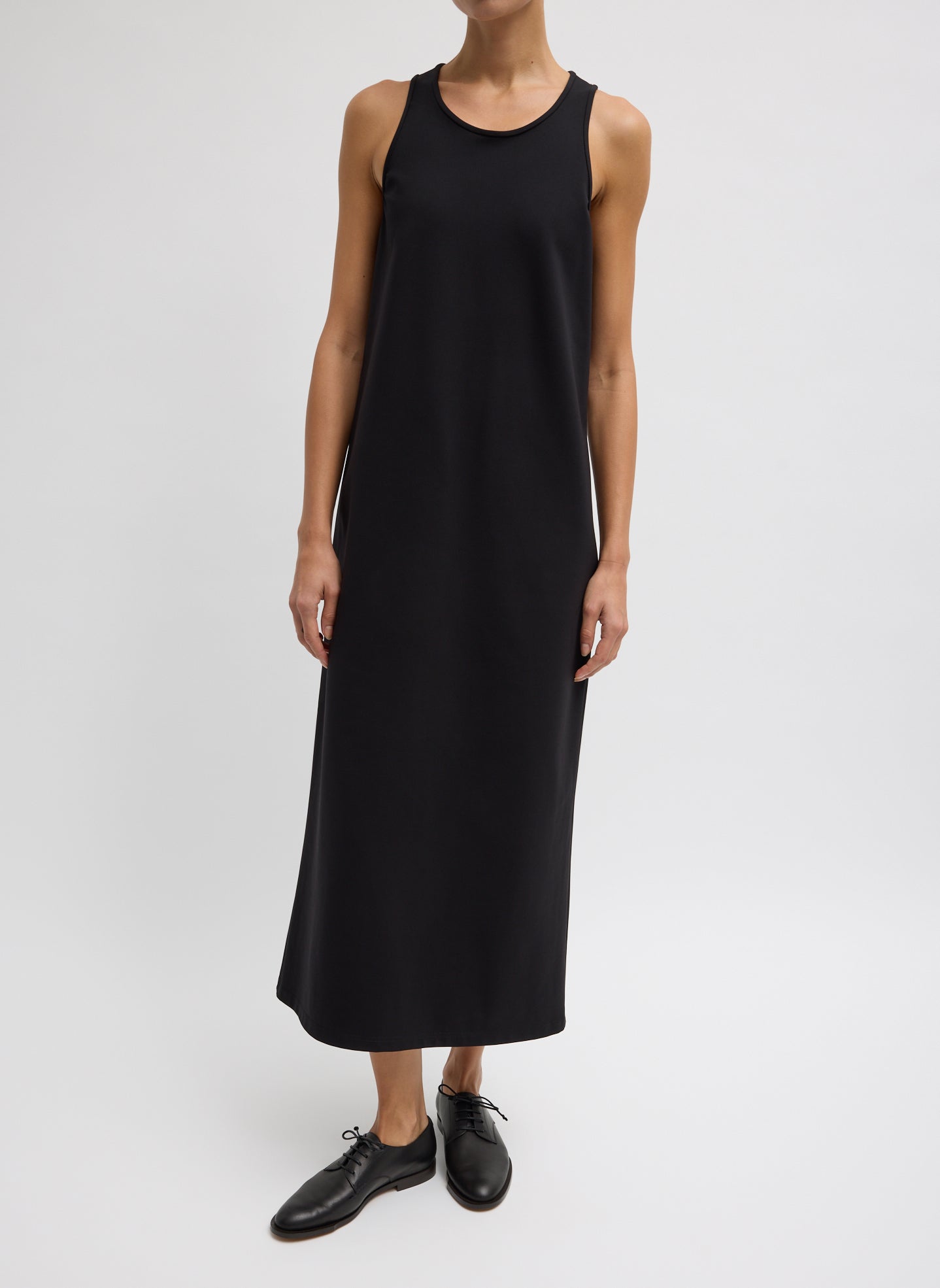 Black Compact Ultra Stretch Knit Sleeveless Maxi Dress - front view on model