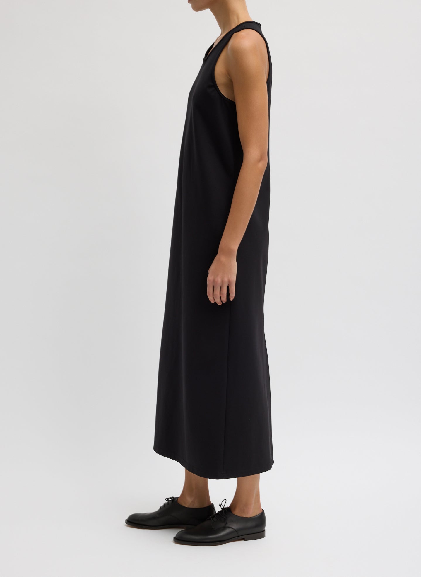 Black Compact Ultra Stretch Knit Sleeveless Maxi Dress - side view on model