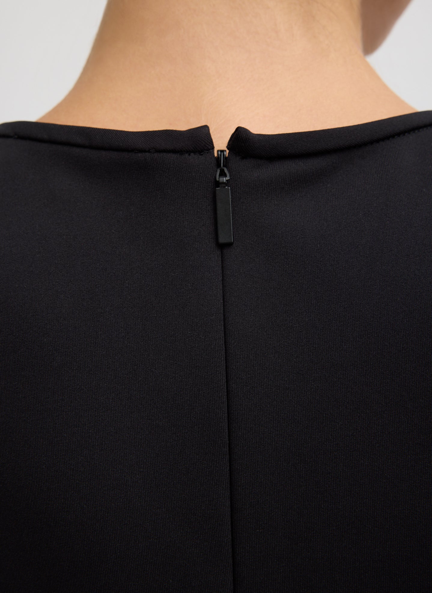 Black Compact Ultra Stretch Knit Sleeveless Maxi Dress - closeup of zip detail at back