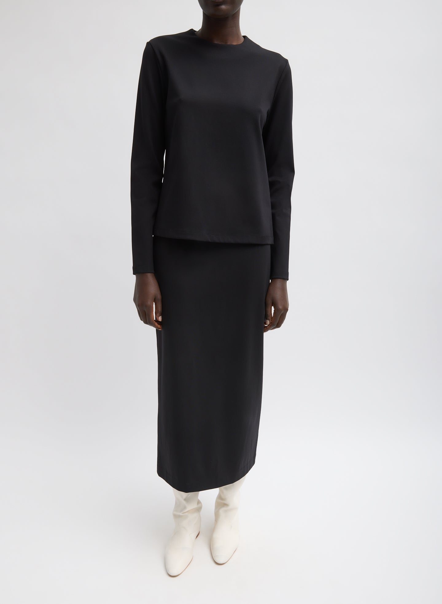 Black Compact Ultra Stretch Knit Pencil Skirt - midi skirt, front view on model