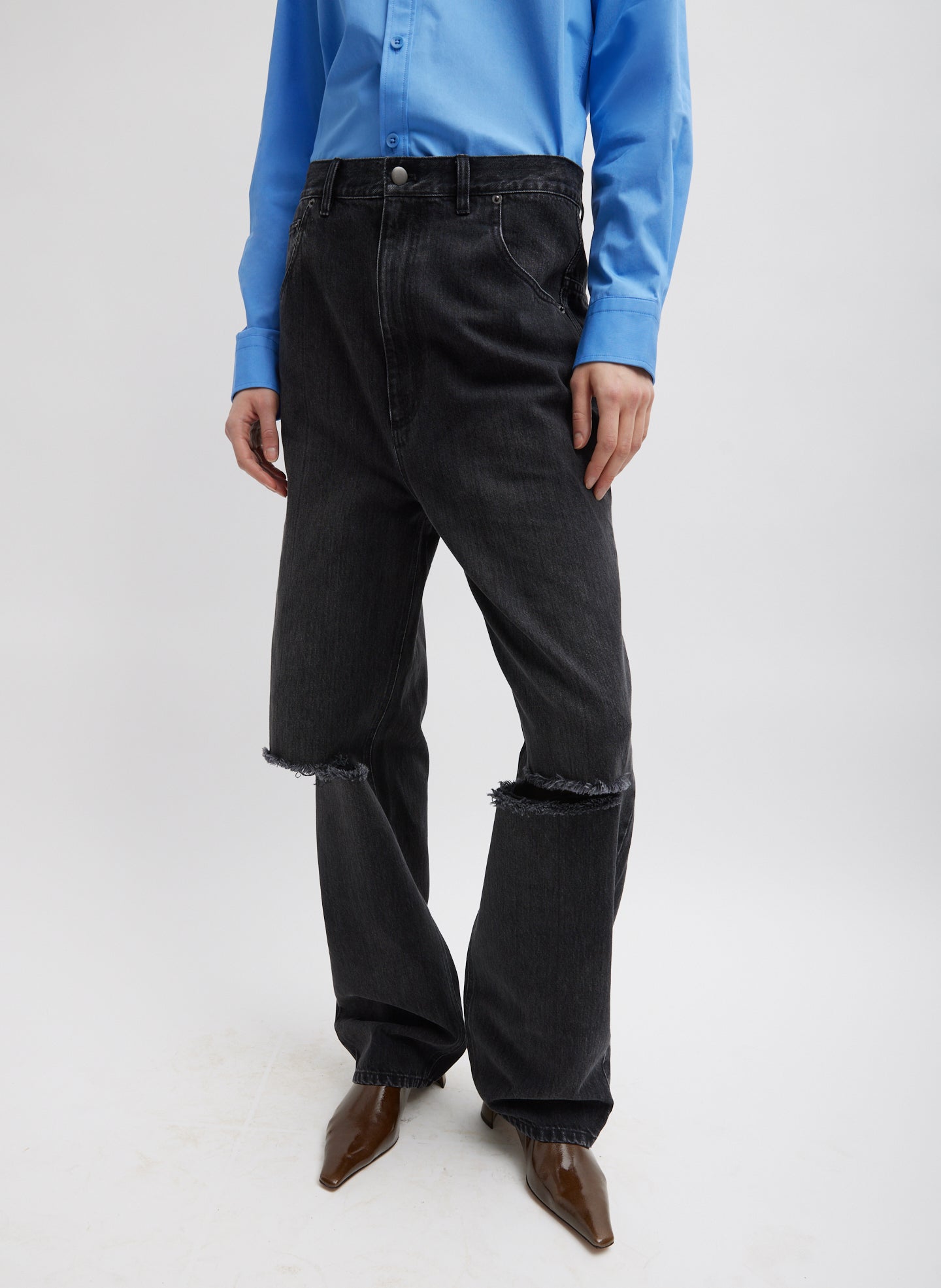 Vintage Black Denim Ryder Jean - ripped jeans, front view on model
