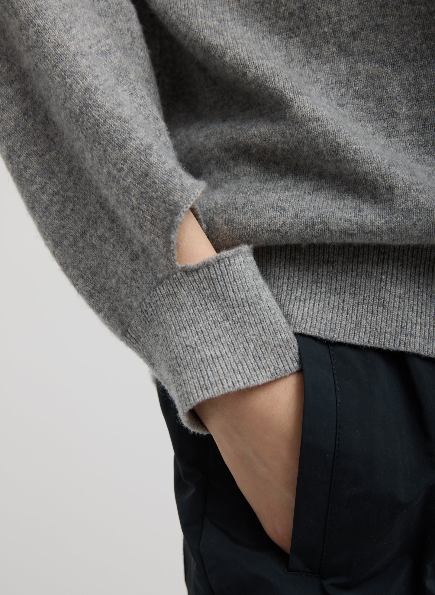 Heather Grey Washable Cashmere Easy Polo Sweater - closeup of cutout detail at wrist