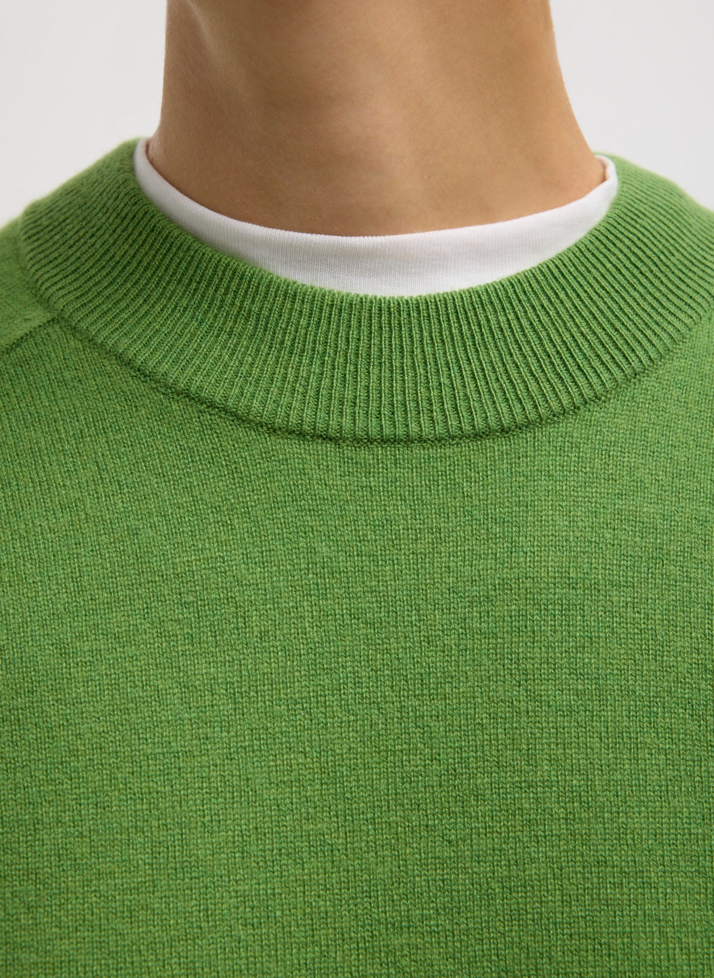 Avocado Green Washable Cashmere Crewneck Cutout Sleeve Sweater - closeup of crewneck neckline