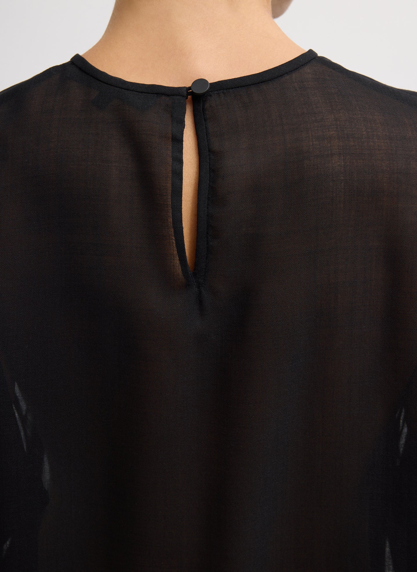 Black Sheer Wool Gauze Easy T-Shirt - closeup of closure at back