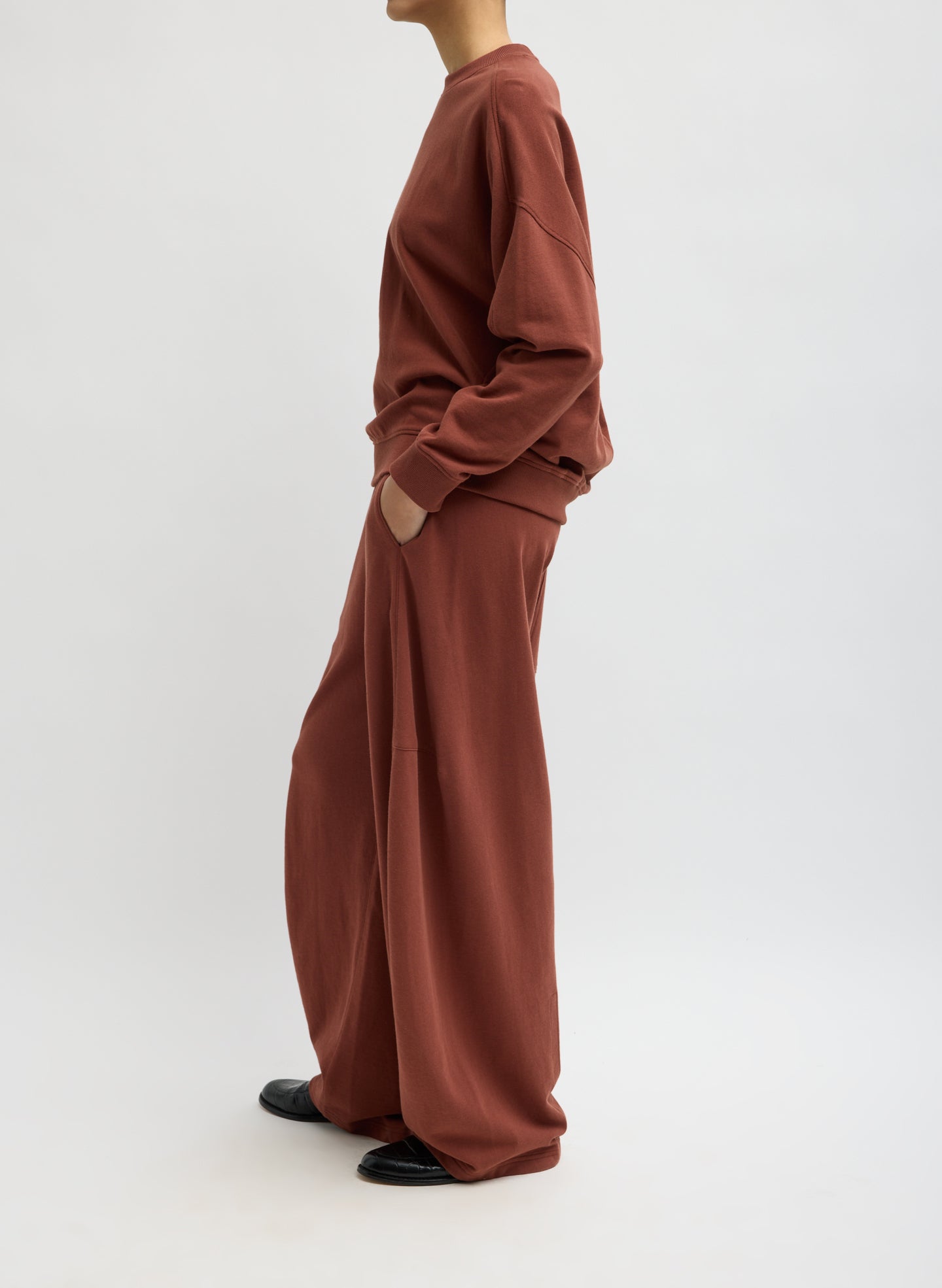 Red Clay Light Weight Sweatshirting Winslow Pant - barrel leg sweatpant, side view on model