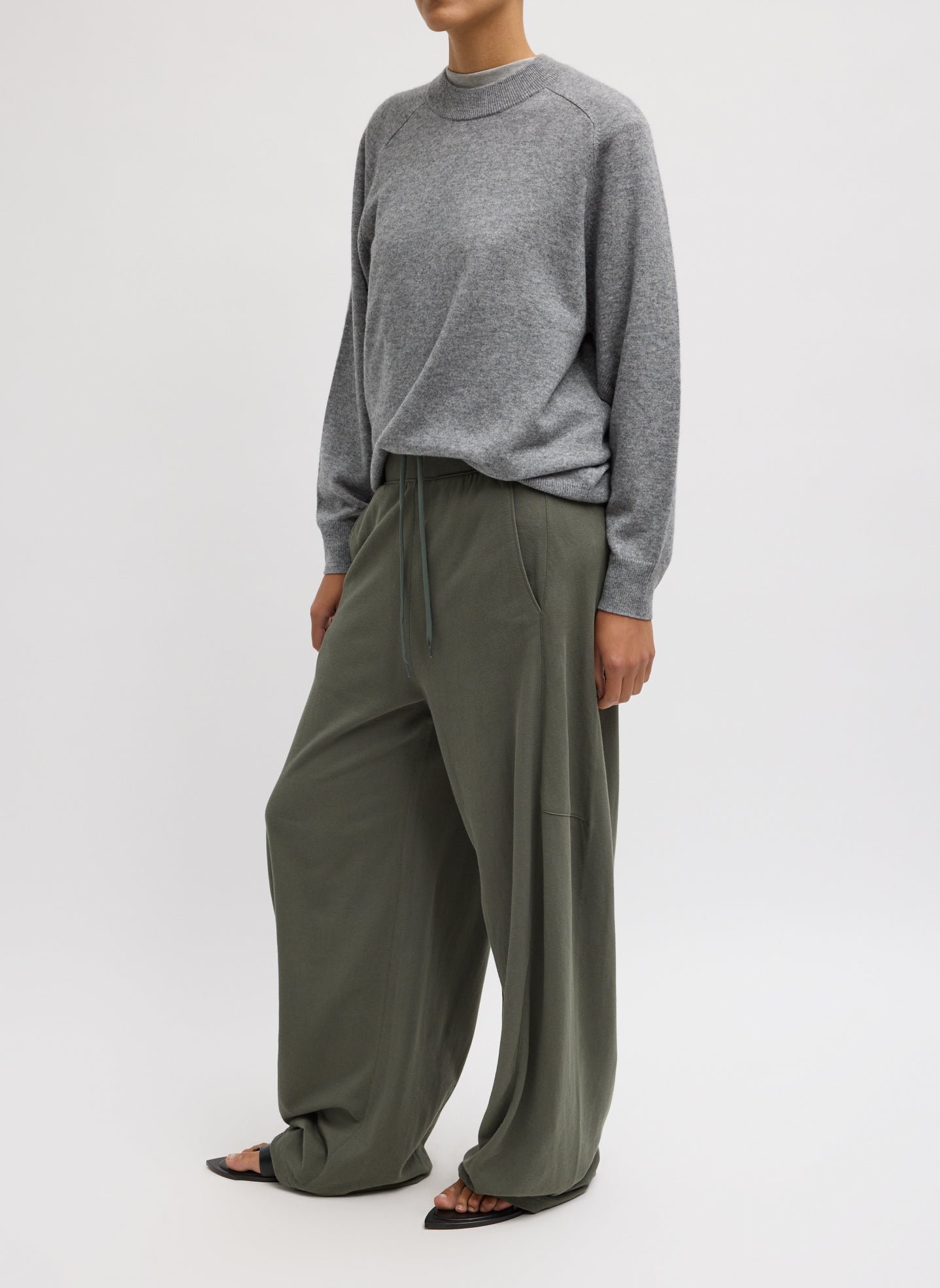 Olive Green Light Weight Sweatshirting Winslow Pant - barrel leg sweatpant, side view on model