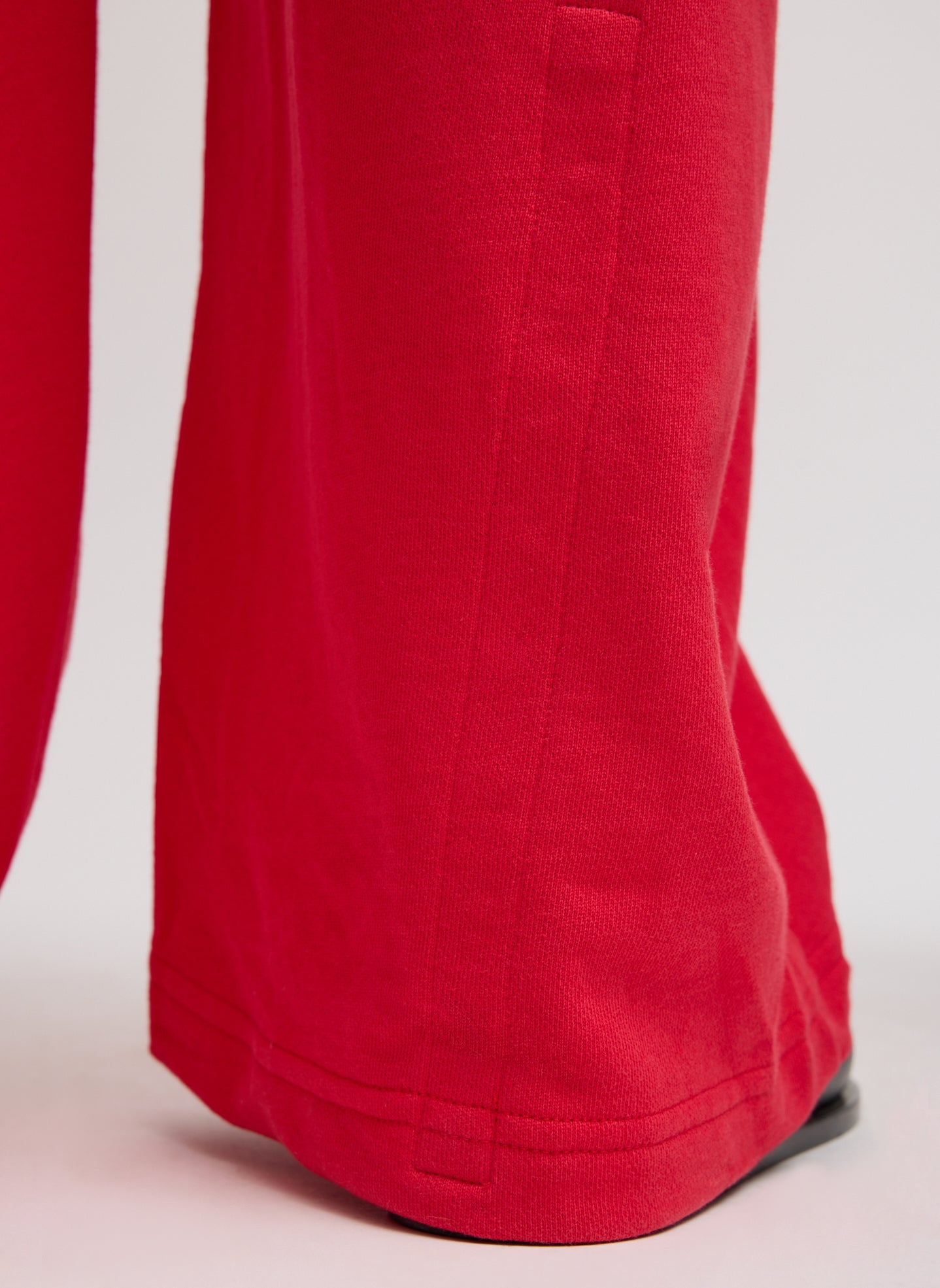Red Light Weight Sweatshirting Winslow Pant - closeup of hidden snap detail
