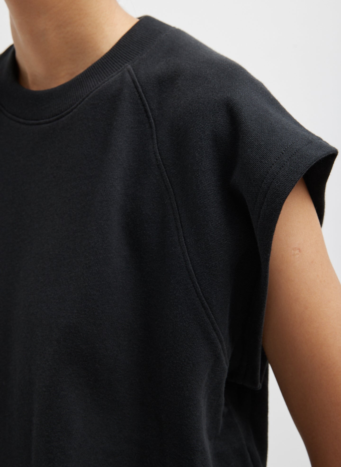 Black Light Weight Sweatshirting Sleeveless Easy Top - closeup of sleeve detail