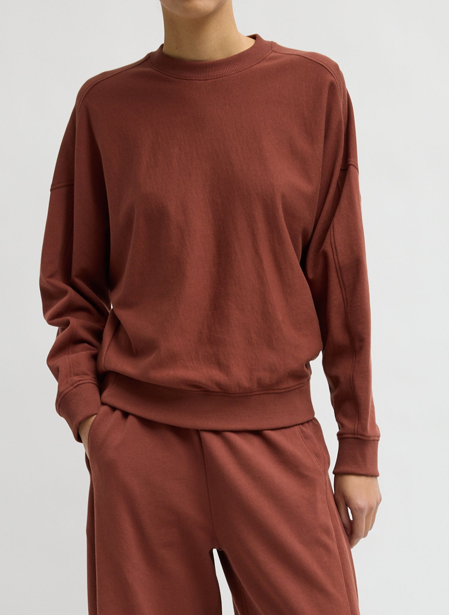 Red Clay Light Weight Sweatshirting Crewneck Sweatshirt - front view on model