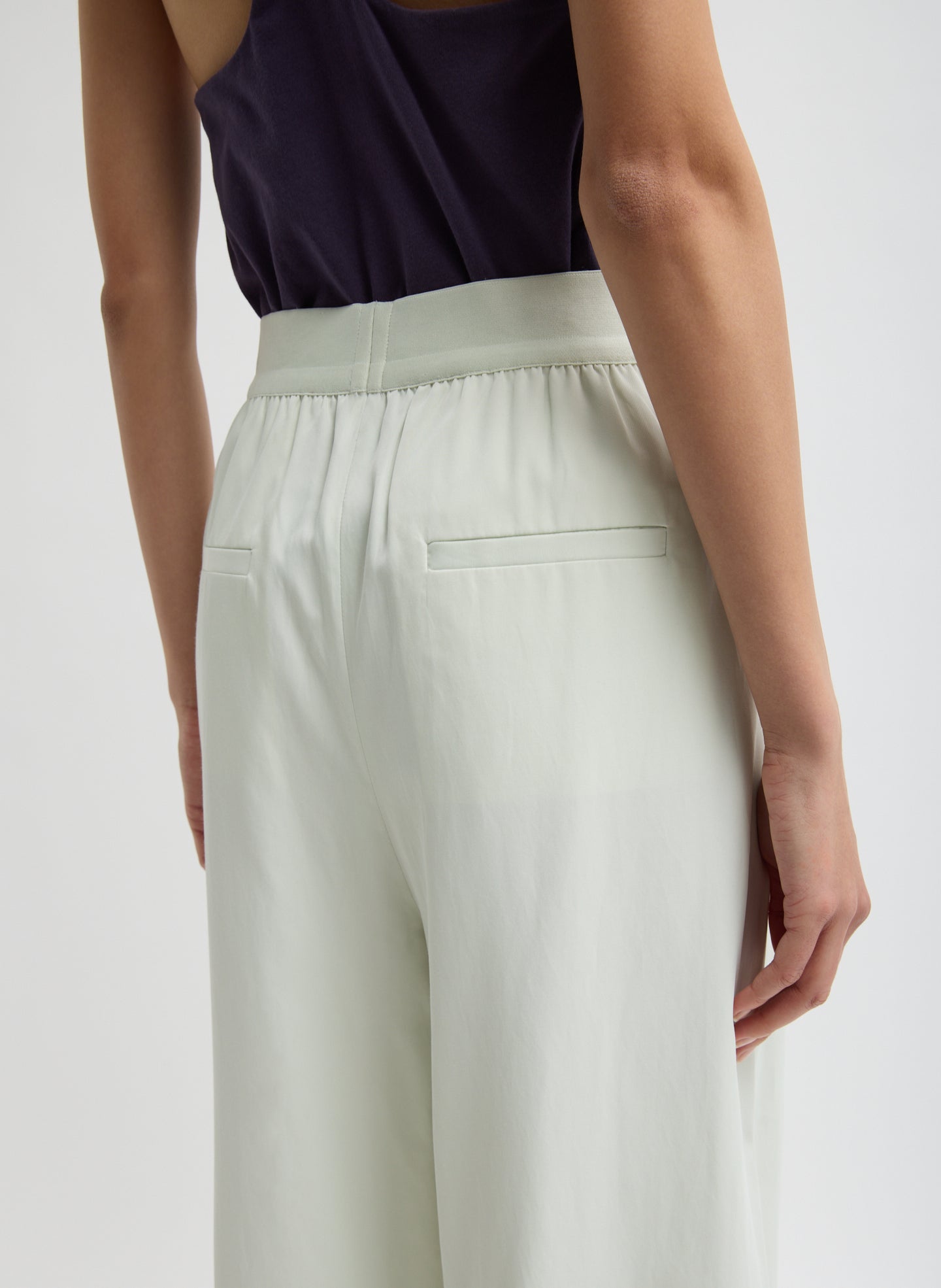 Faded Pale Green Drapey Suiting Marit Pull On Pant - closeup of back pocket details