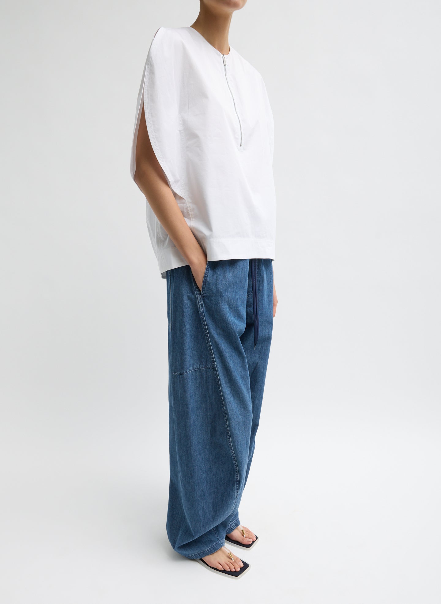 White Eco Poplin Balloon Origami Top - puff sleeve, zip up, side view on model